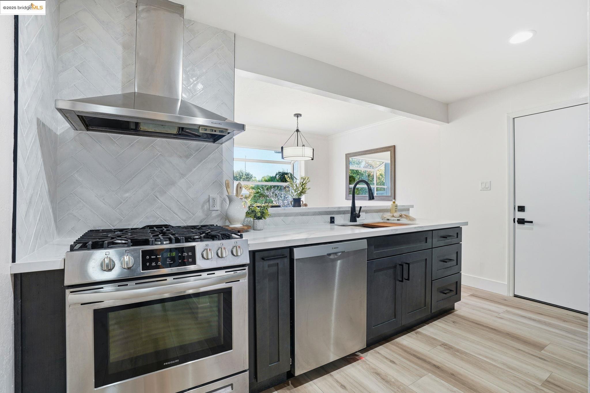 168 High Street Pacheco, CA 94553 - Photo 2 of 33 a kitchen with a stove and a sink