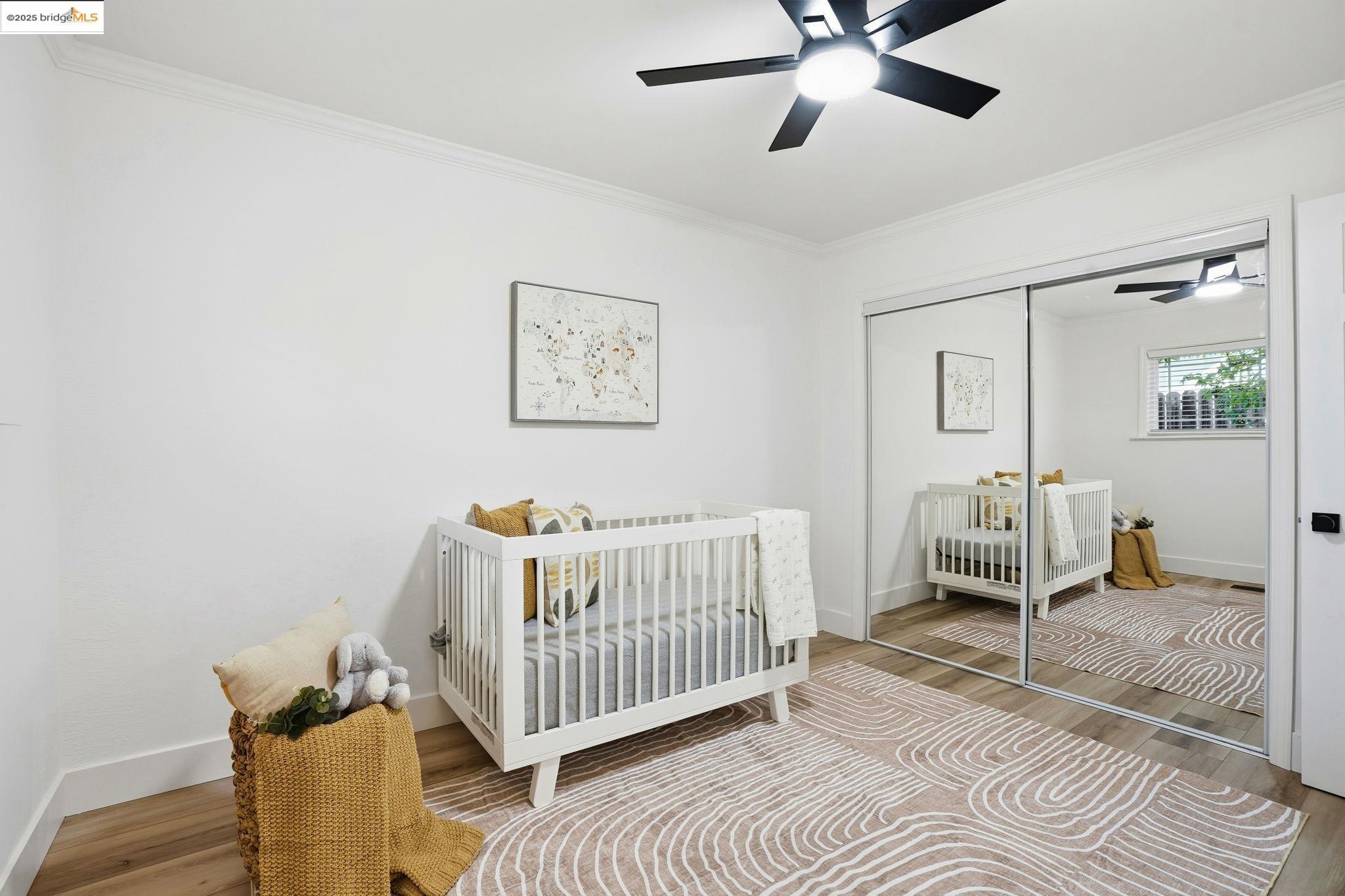168 High Street Pacheco, CA 94553 - Photo 23 of 33 a bedroom with a bed and wooden floor