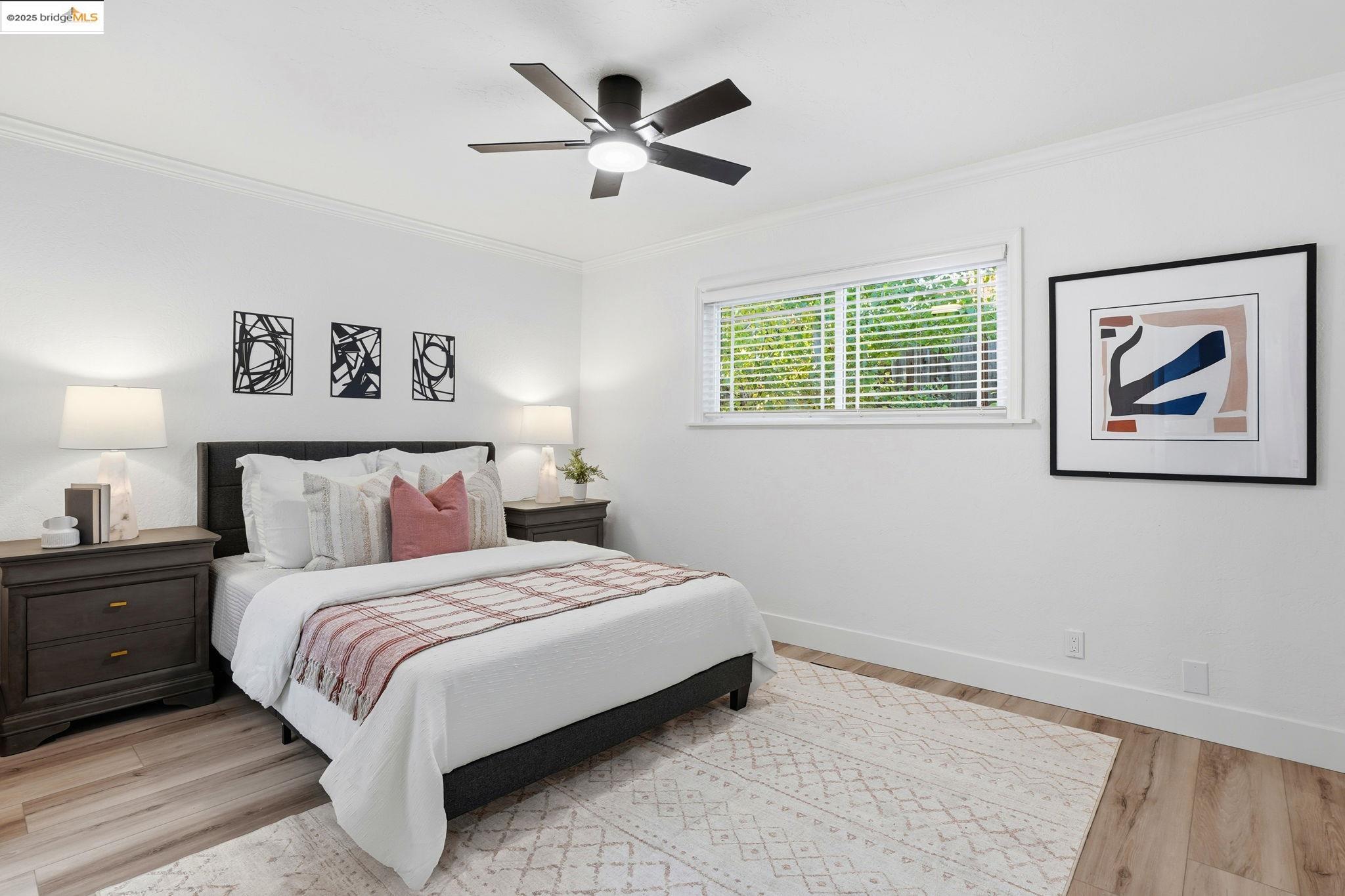 168 High Street Pacheco, CA 94553 - Photo 24 of 33 a bedroom with a large bed and a chandelier