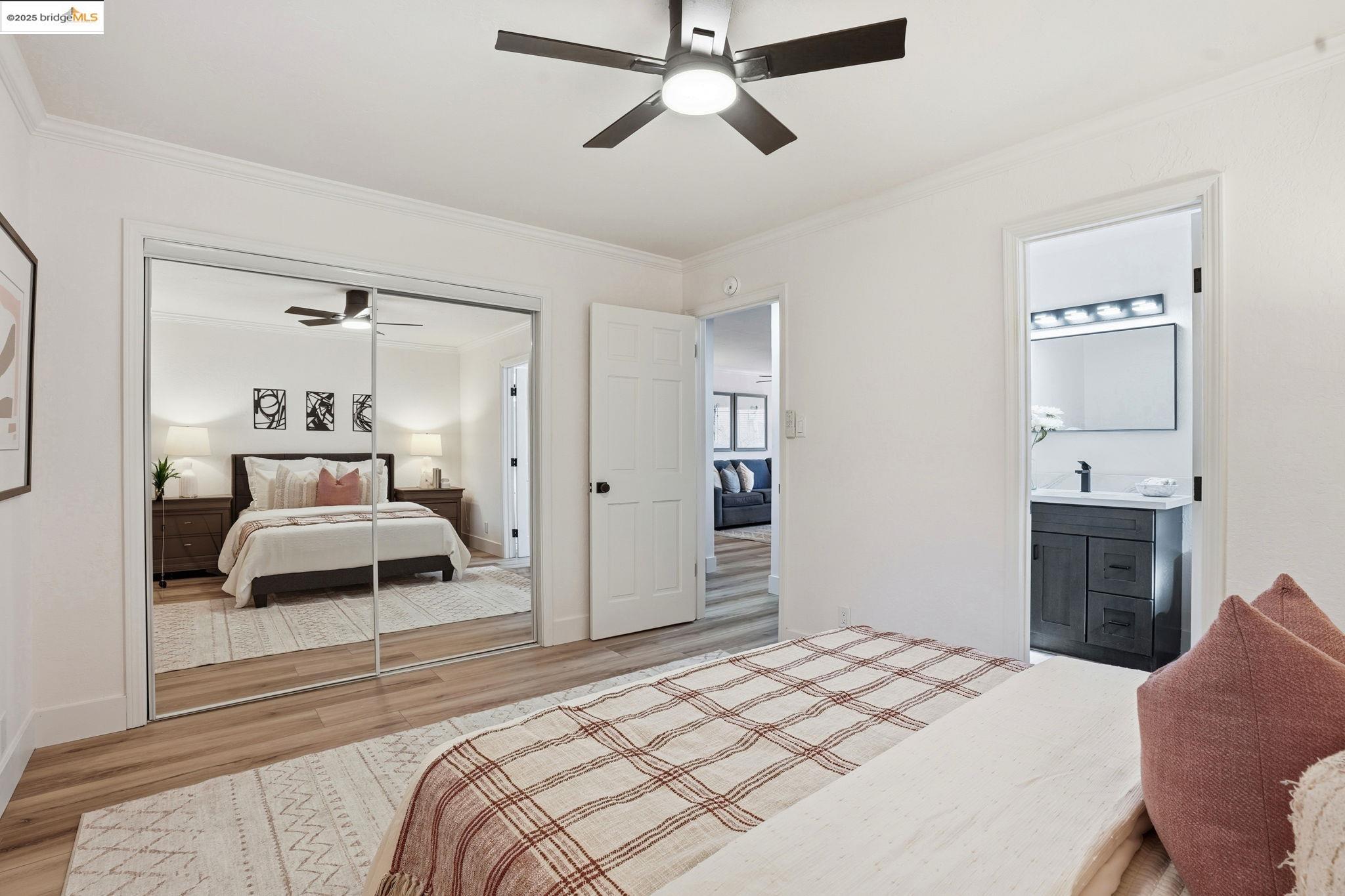 168 High Street Pacheco, CA 94553 - Photo 26 of 33 a bedroom with a bed and a chandelier