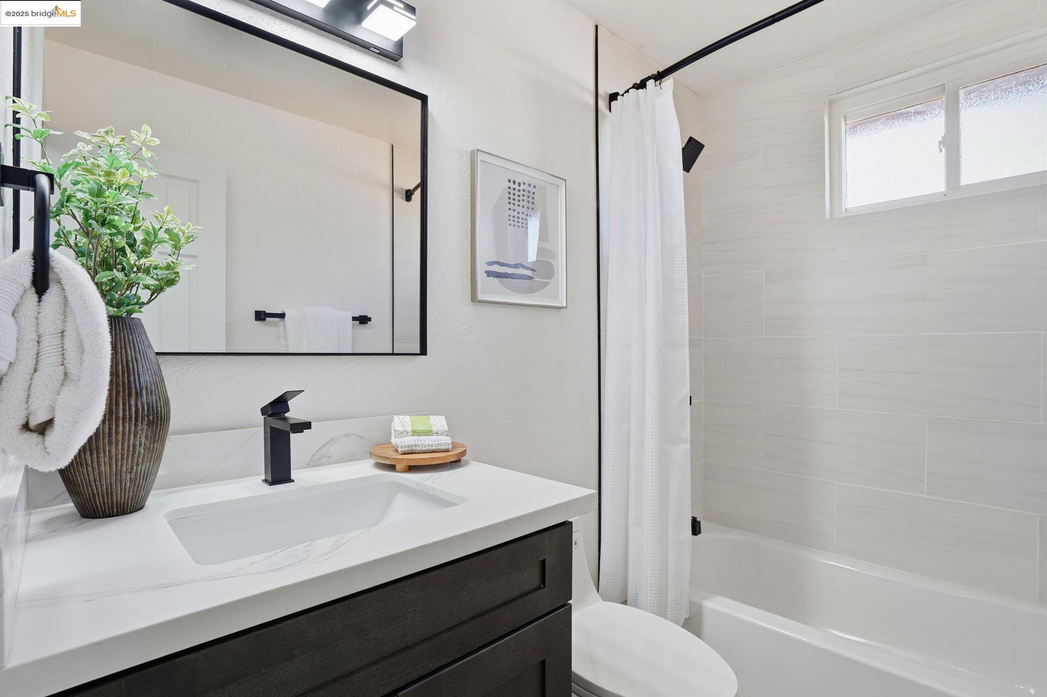 168 High Street Pacheco, CA 94553 - Photo 27 of 33 a bathroom with a sink toilet and shower
