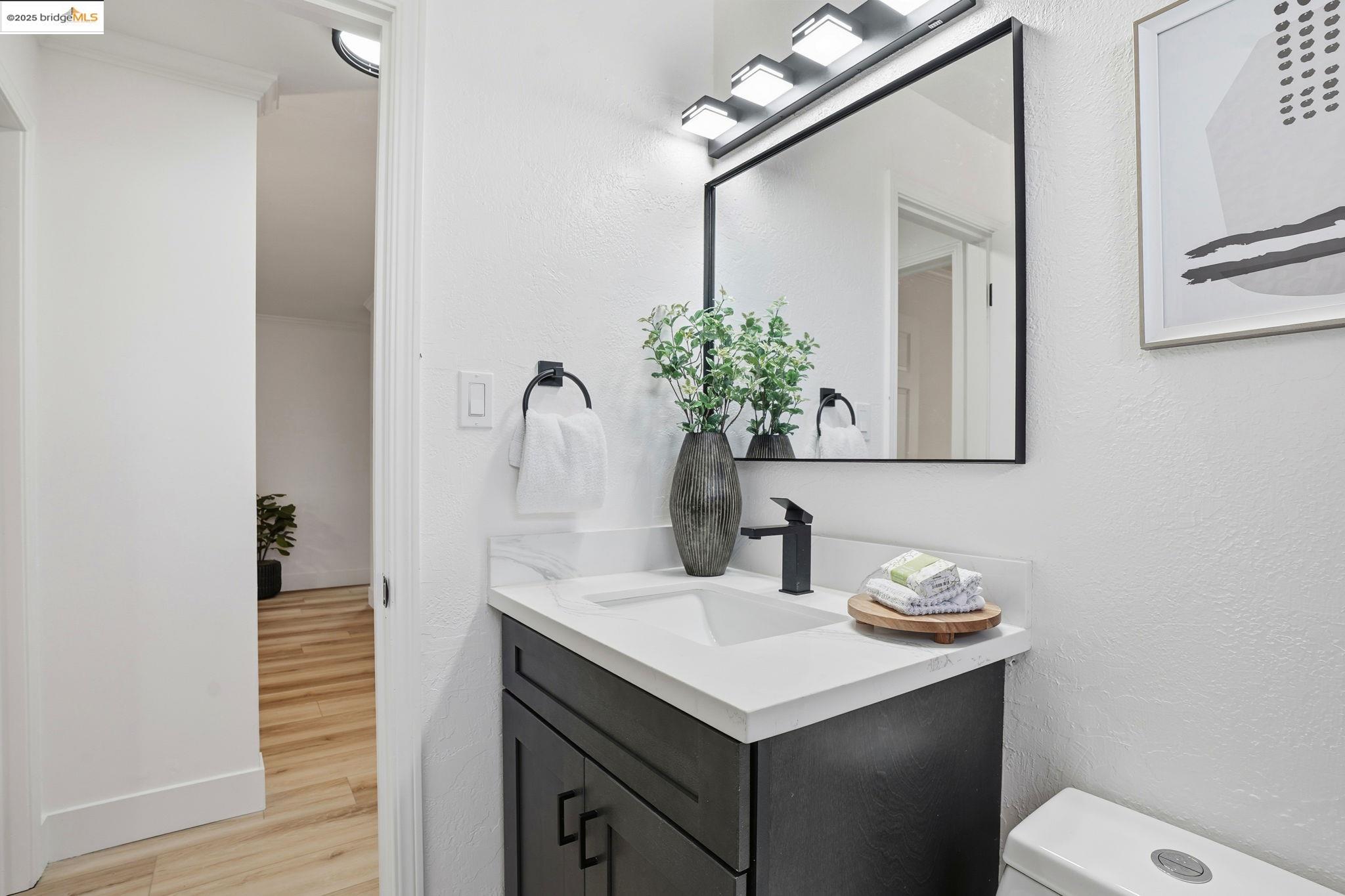 168 High Street Pacheco, CA 94553 - Photo 28 of 33 a bathroom with a sink and a mirror