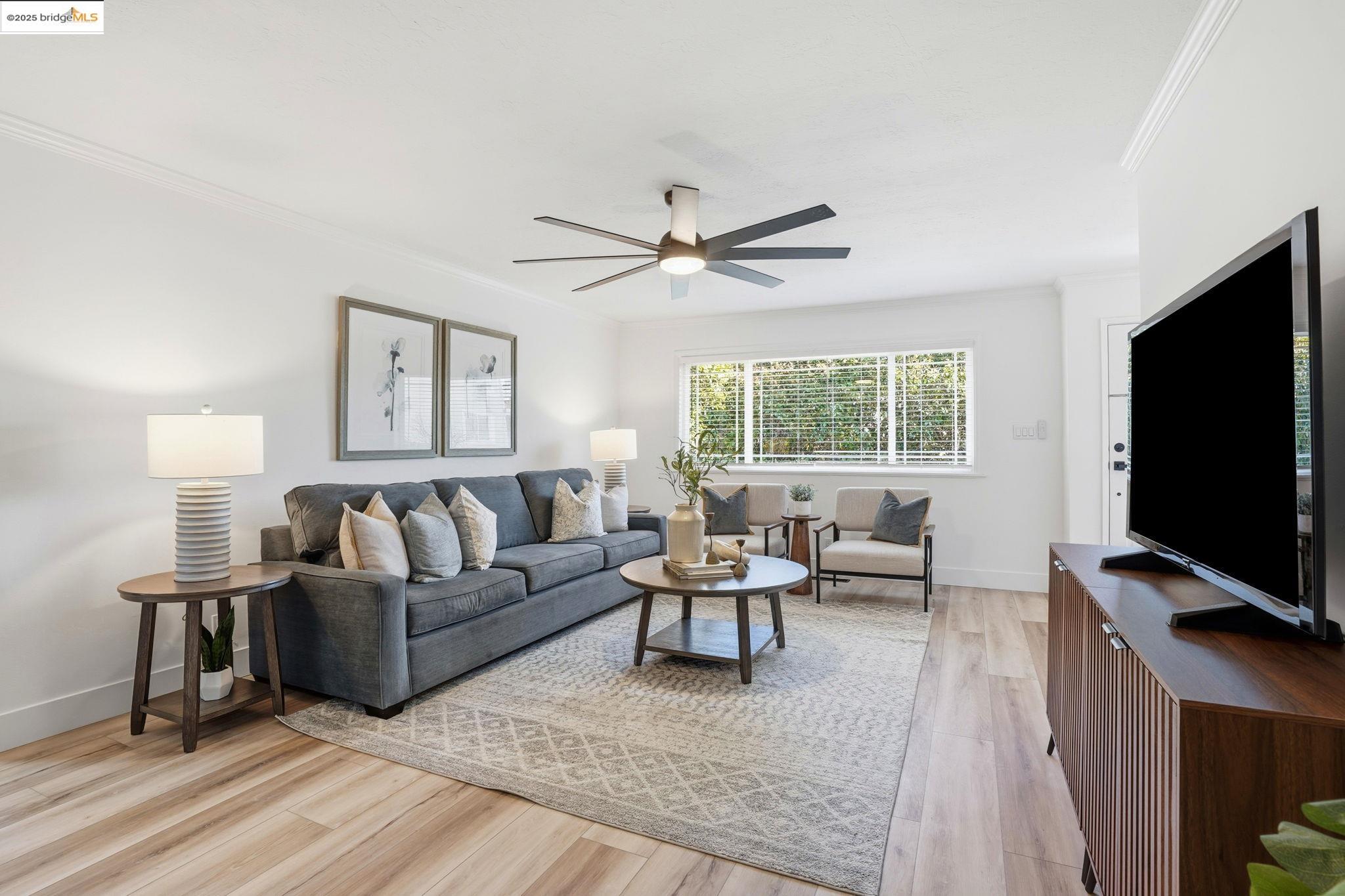 168 High Street Pacheco, CA 94553 - Photo 7 of 33 a living room with furniture and a flat screen tv