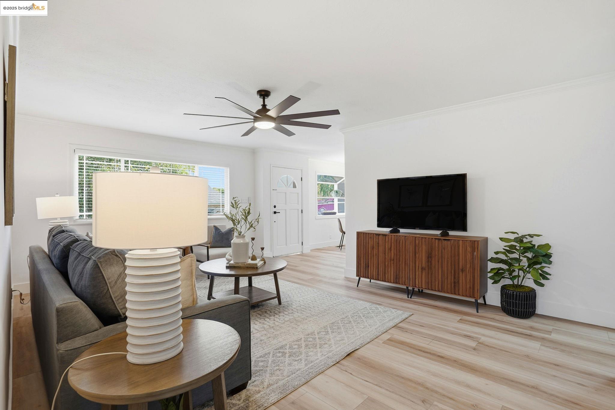 168 High Street Pacheco, CA 94553 - Photo 8 of 33 a living room with furniture and a flat screen tv