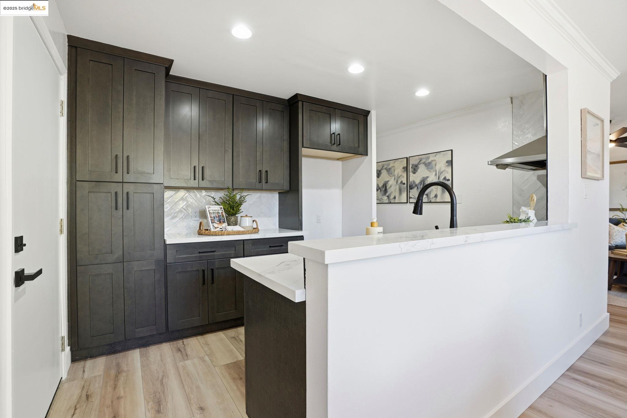 168 High Street Pacheco, CA 94553 - Photo 10 of 33 a kitchen with kitchen island a sink stainless steel appliances and cabinets