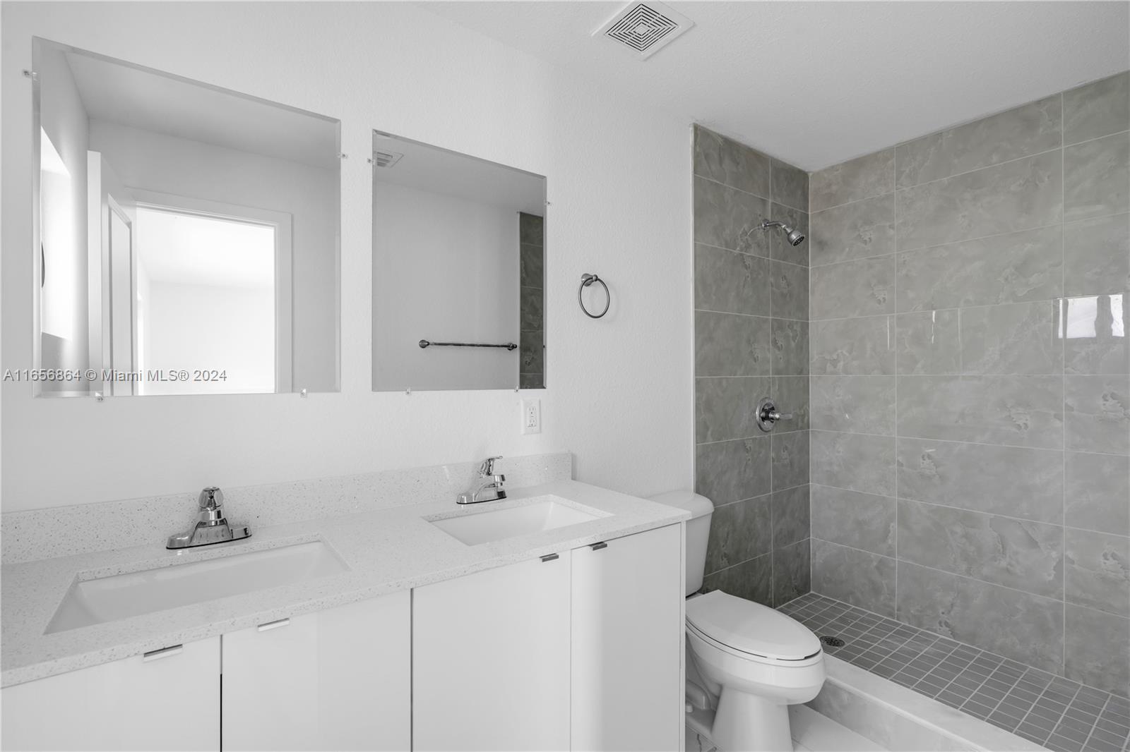 152 Northwest 18th Street Homestead, FL 33030 - Photo 11 of 28 a bathroom with a sink toilet and shower