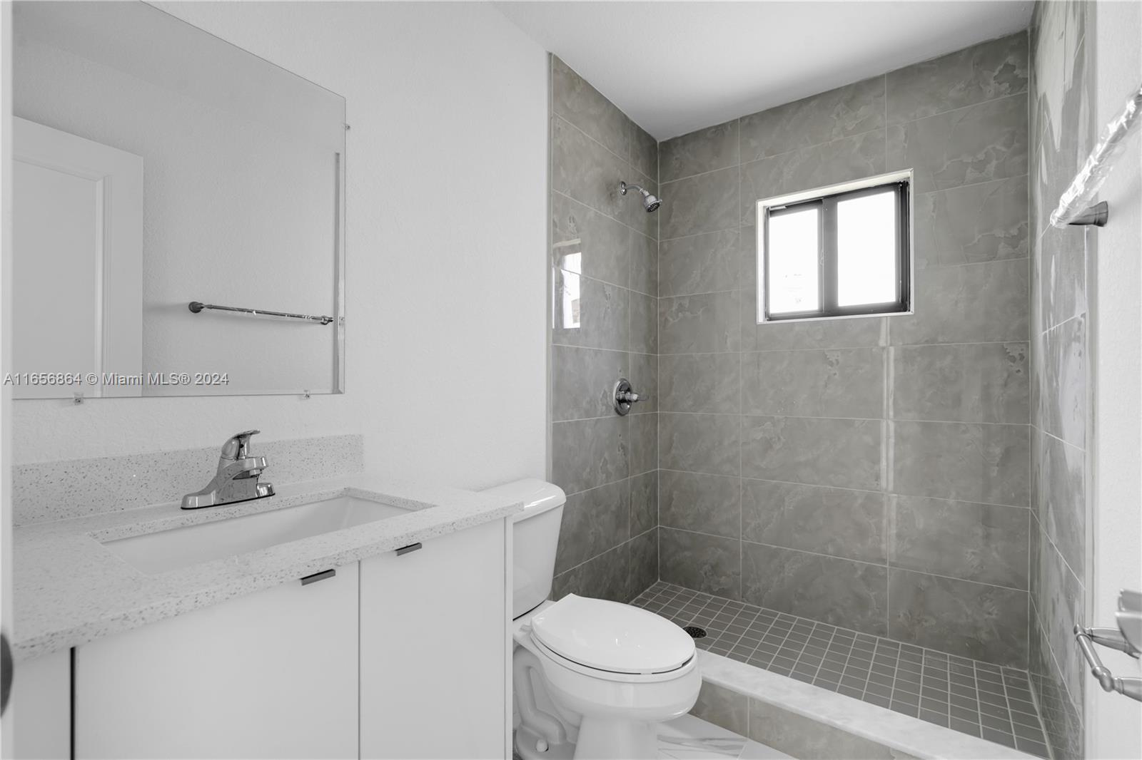 152 Northwest 18th Street Homestead, FL 33030 - Photo 16 of 28 a bathroom with a sink toilet and shower