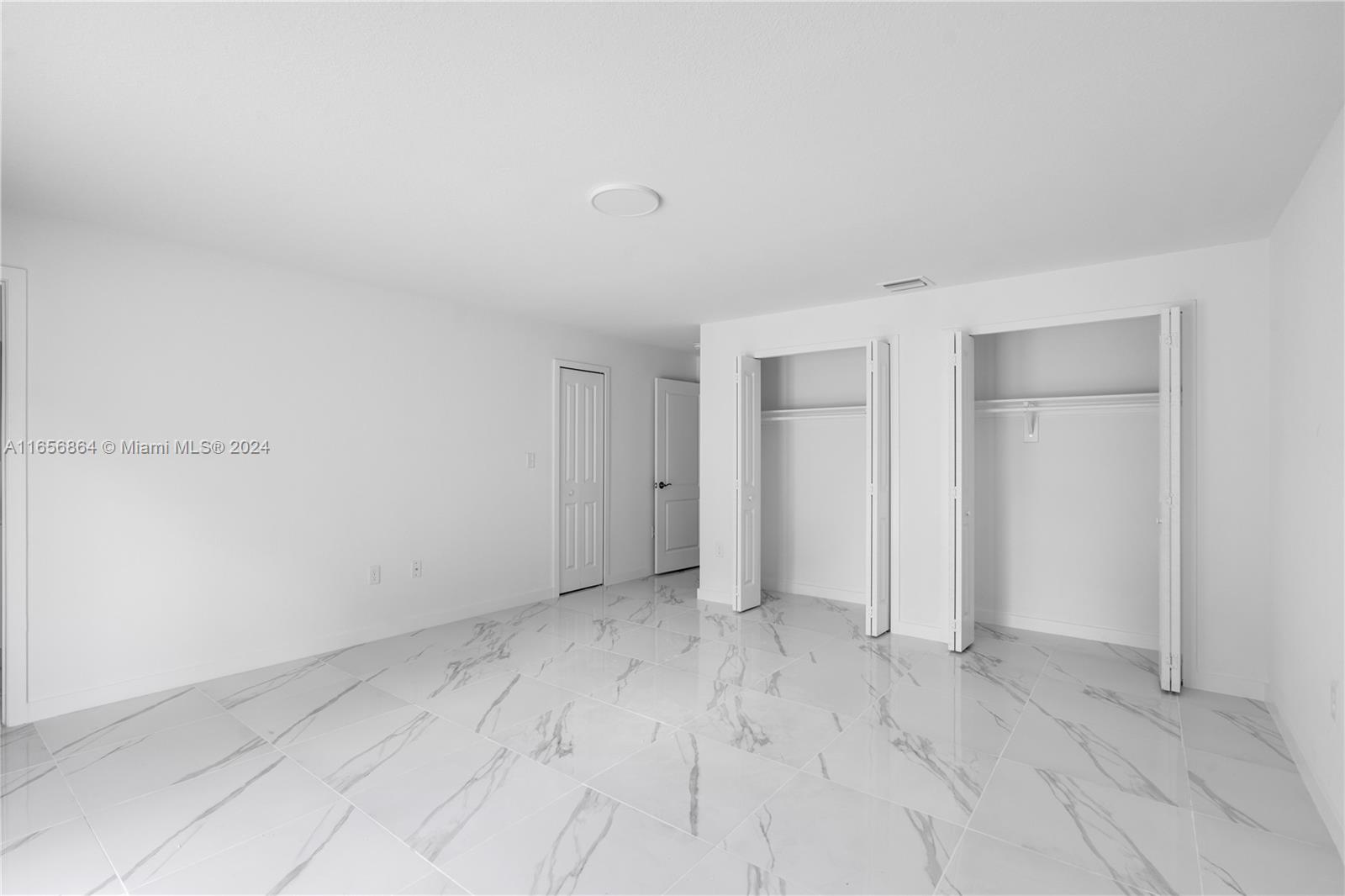 152 Northwest 18th Street Homestead, FL 33030 - Photo 18 of 28 a view of an empty room