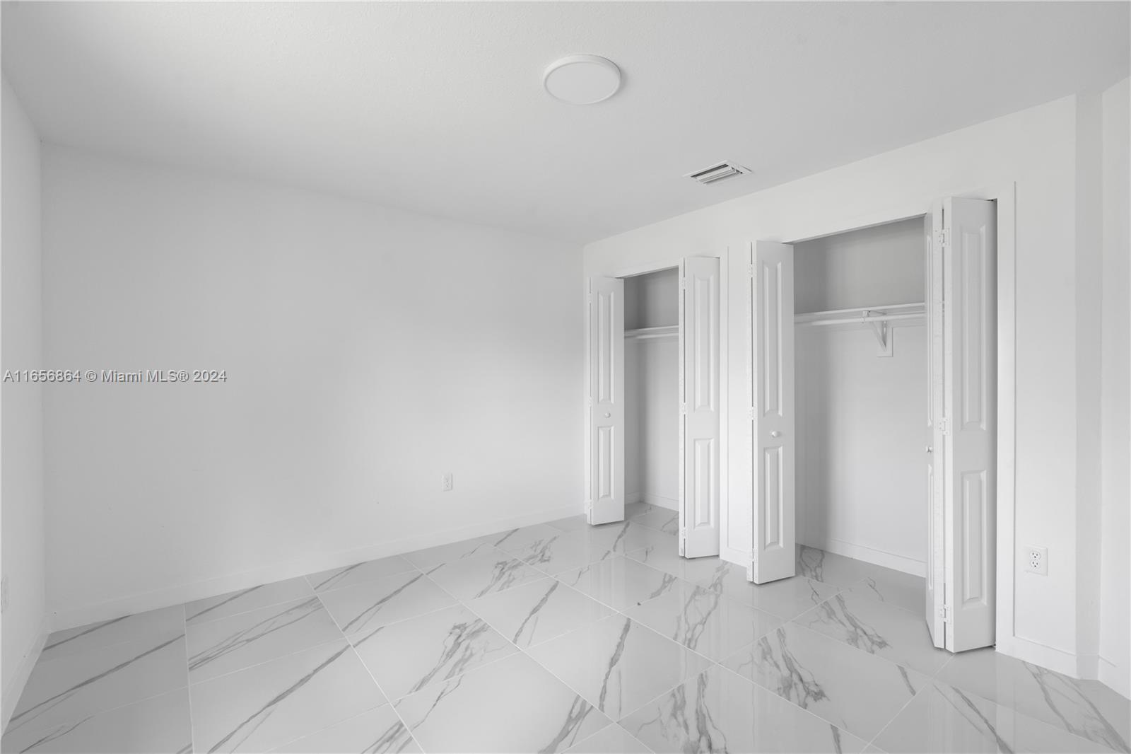 152 Northwest 18th Street Homestead, FL 33030 - Photo 20 of 28 a view of an empty room