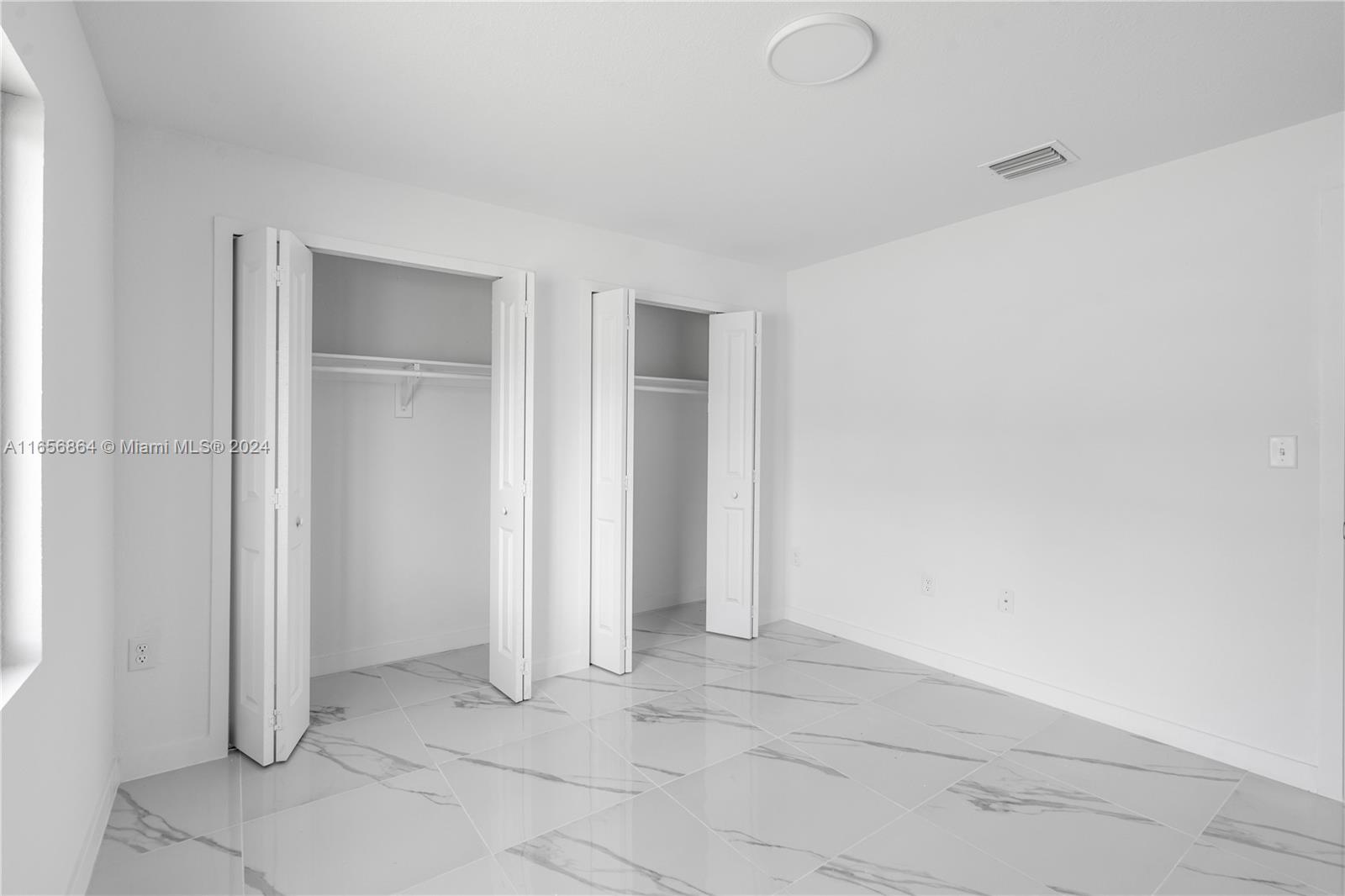 152 Northwest 18th Street Homestead, FL 33030 - Photo 24 of 28 a view of an empty room