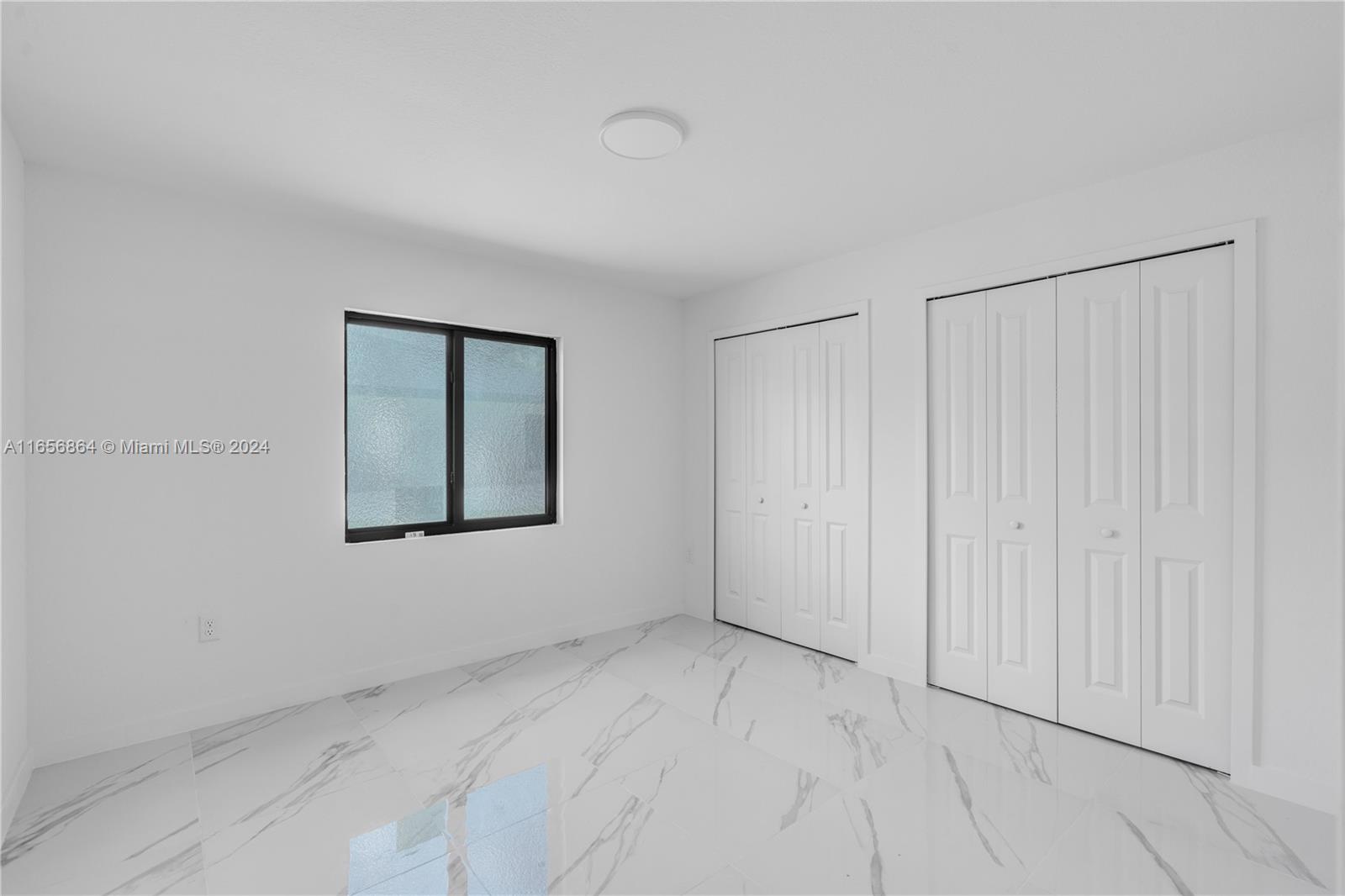 152 Northwest 18th Street Homestead, FL 33030 - Photo 25 of 28 a view of an empty room with closet