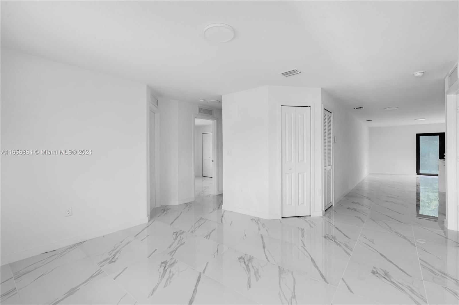 152 Northwest 18th Street Homestead, FL 33030 - Photo 9 of 28 a view of empty room