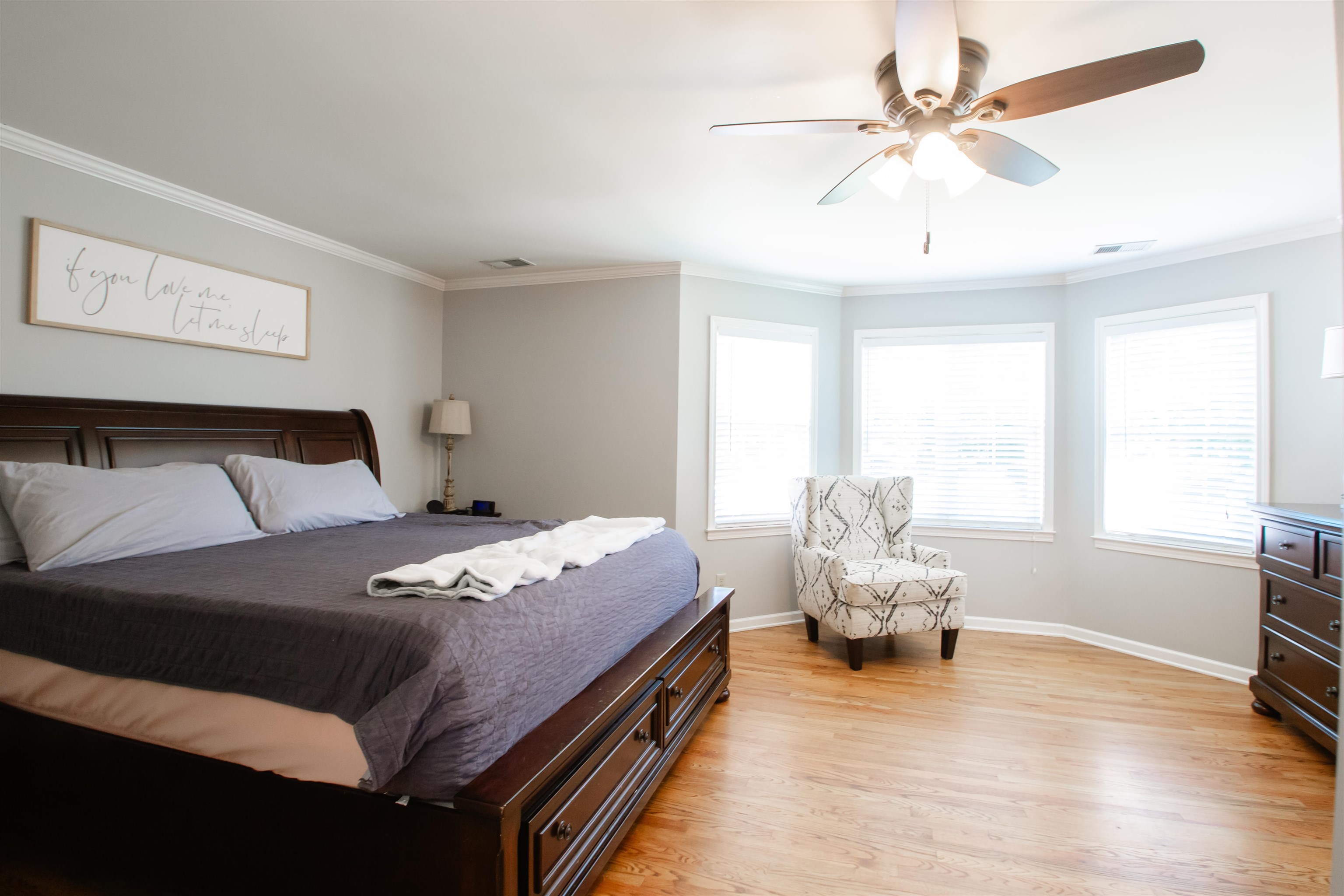 74 Huffman Road Brighton, TN 38011 - Photo 13 of 28 Bedroom with ornamental molding, light hardwood / wood-style flooring, and ceiling fan
