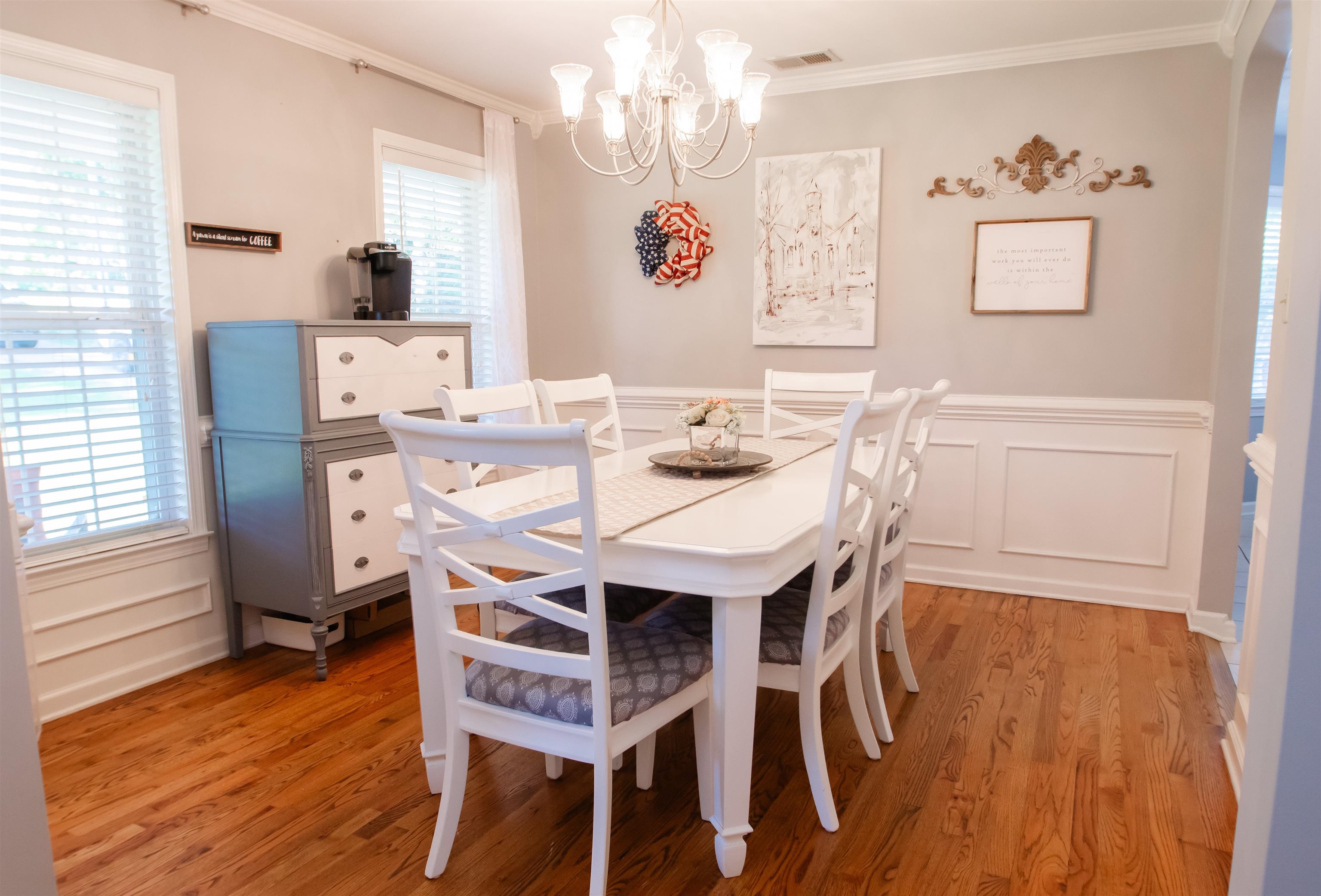 74 Huffman Road Brighton, TN 38011 - Photo 6 of 28 Dining room with crown molding, light wood-type flooring, and a notable chandelier