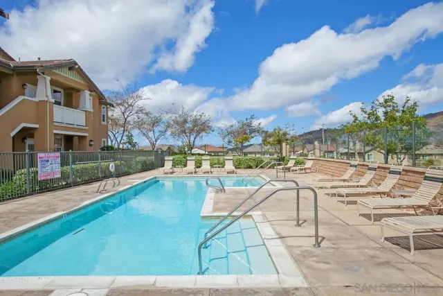 a view of a park with large trees
