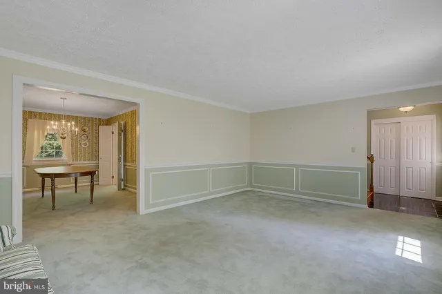 a view of a kitchen cabinets and a stove