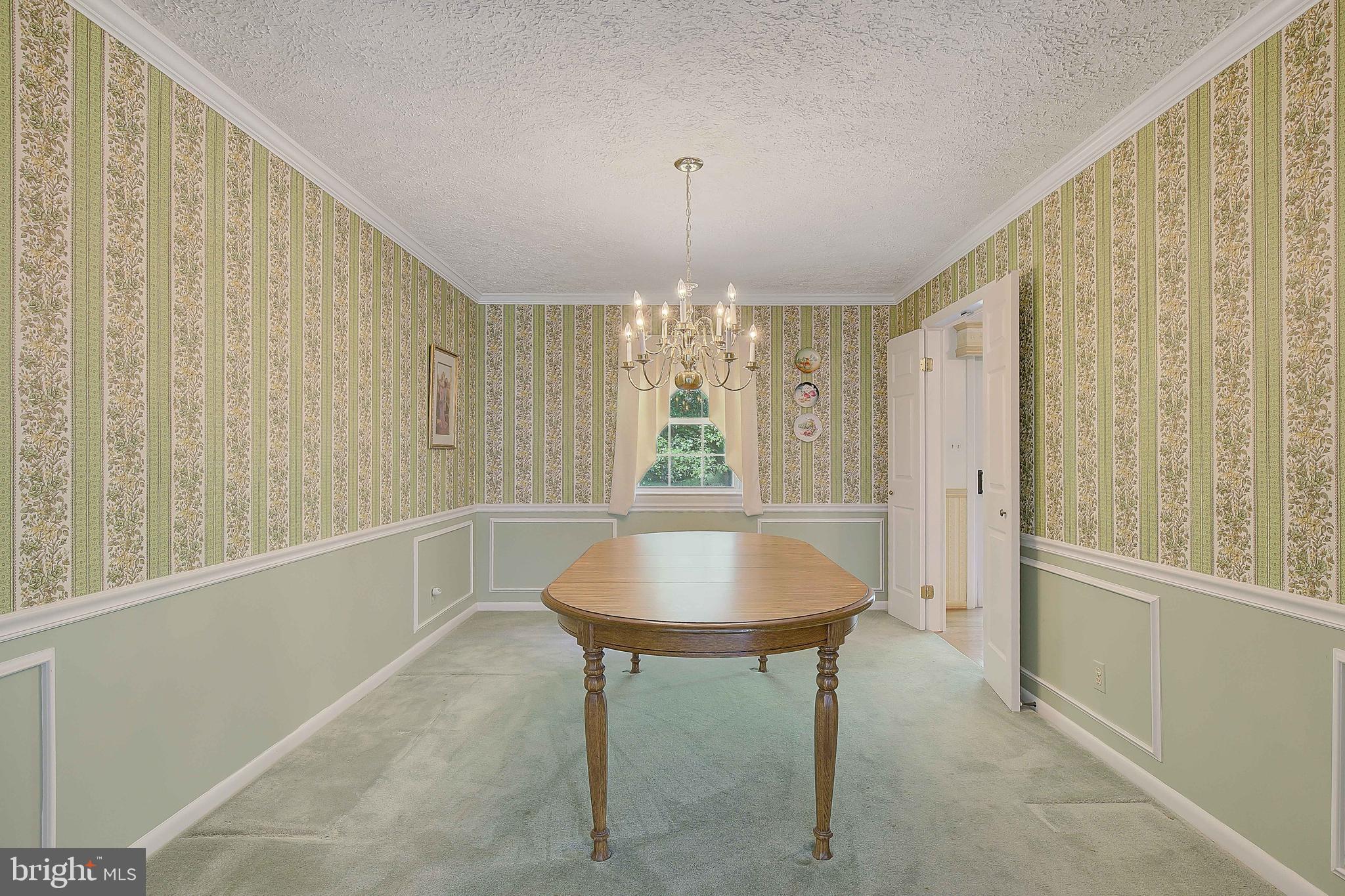 1750 Timber Court Huntingtown, MD 20639 - Photo 18 of 57 a spacious bathroom with a tub and chandelier