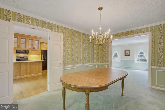 a kitchen with a sink and a window