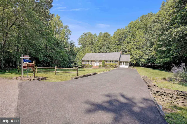 a bedroom with a bed and dresser