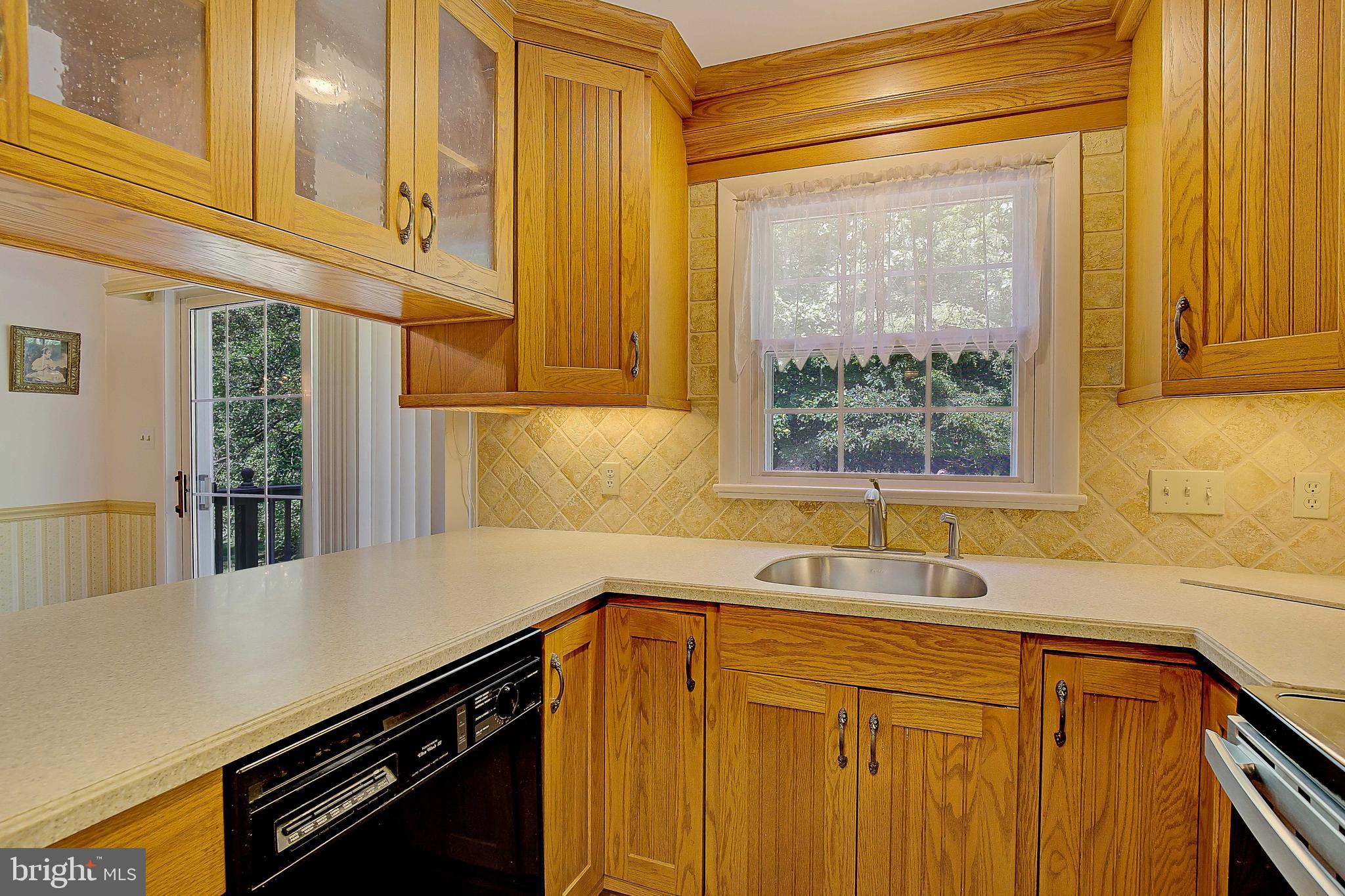 1750 Timber Court Huntingtown, MD 20639 - Photo 26 of 57 a kitchen with a sink and a window