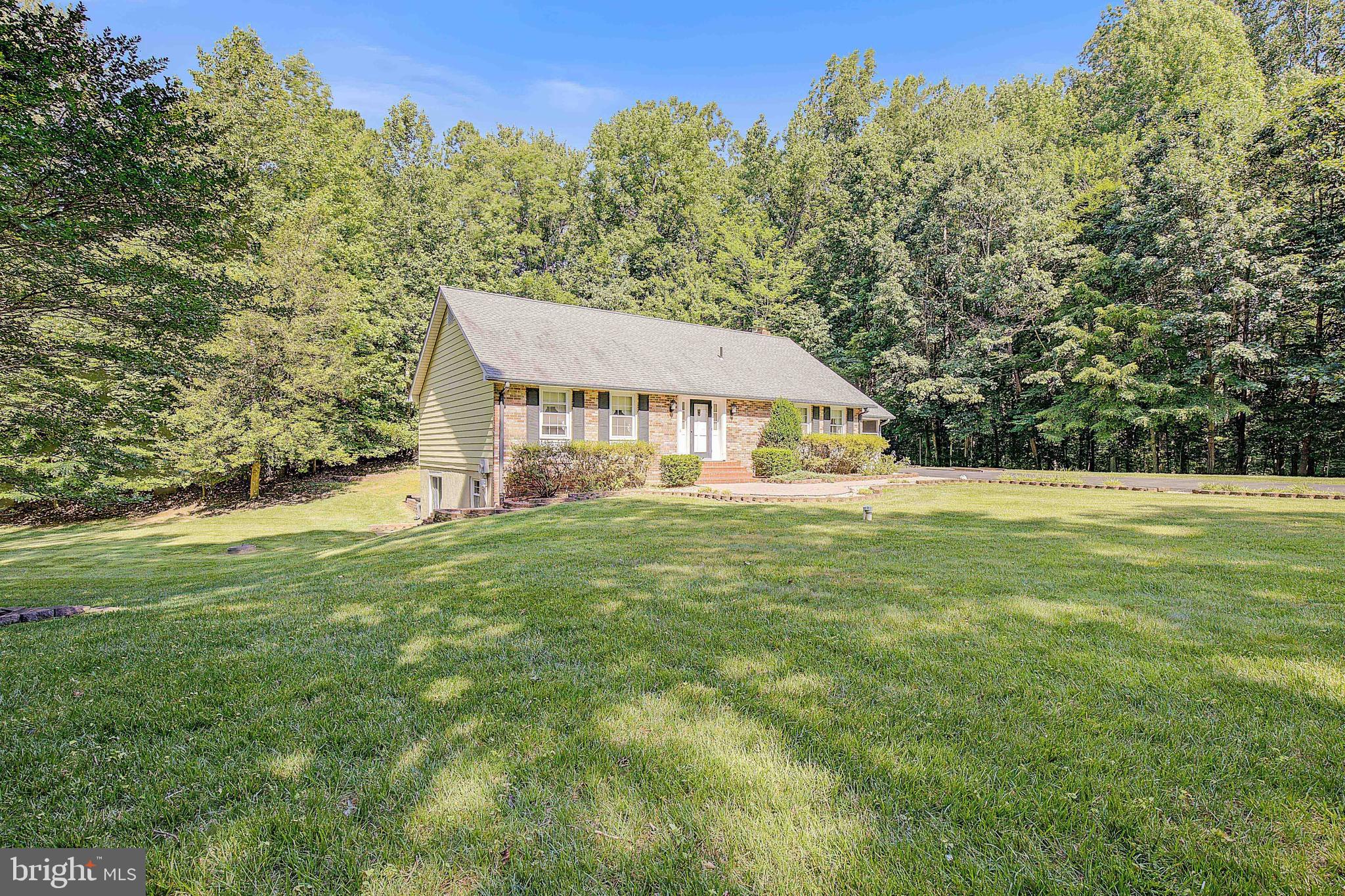 1750 Timber Court Huntingtown, MD 20639 - Photo 29 of 57 a view of a house with a big yard