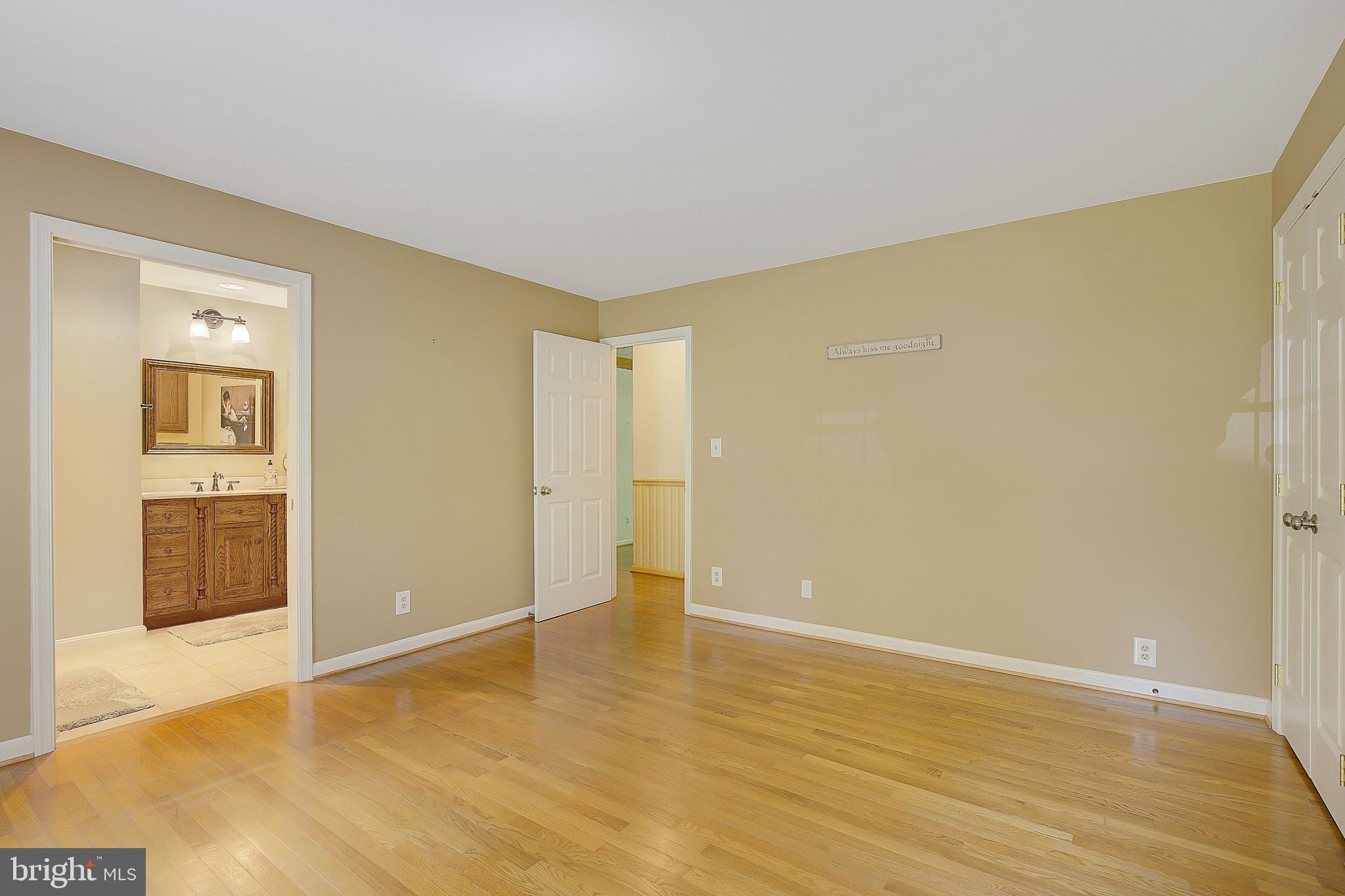 1750 Timber Court Huntingtown, MD 20639 - Photo 30 of 57 a view of an empty room with wooden floor
