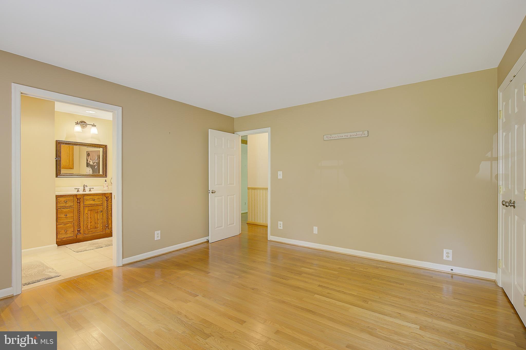1750 Timber Court Huntingtown, MD 20639 - Photo 33 of 57 a view of an empty room with wooden floor