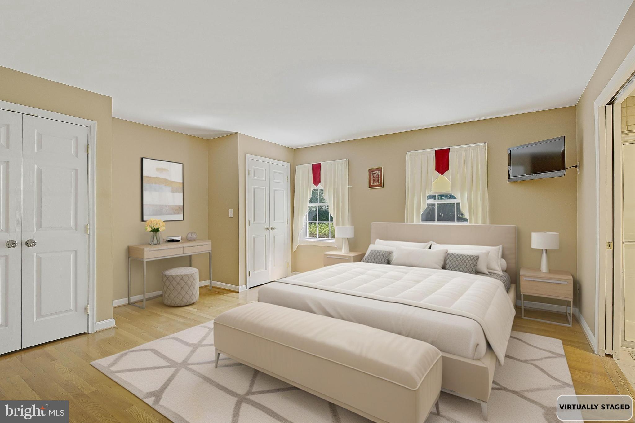 1750 Timber Court Huntingtown, MD 20639 - Photo 4 of 57 a bedroom with a bed and a view of bathroom