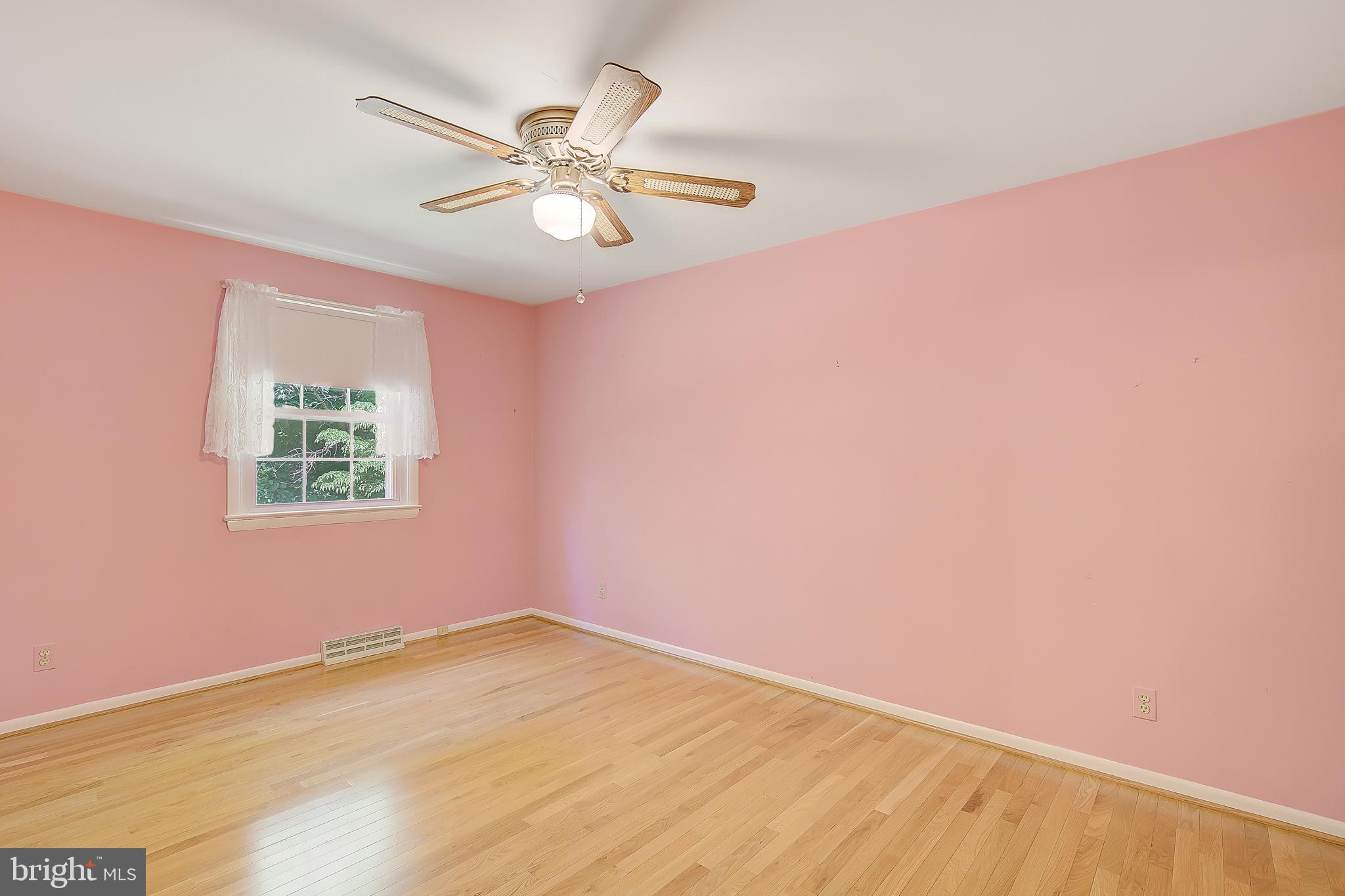1750 Timber Court Huntingtown, MD 20639 - Photo 50 of 57 an empty room with a window and a fan