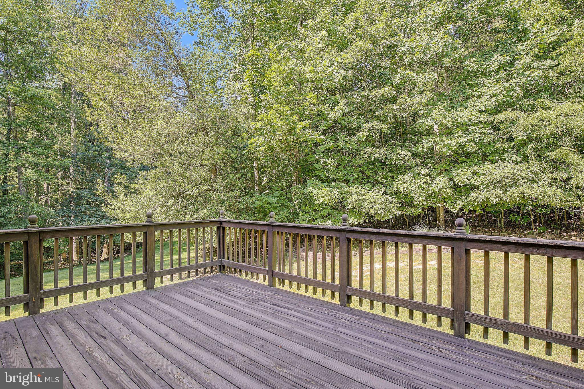 1750 Timber Court Huntingtown, MD 20639 - Photo 52 of 57 a balcony with wooden floor and fence