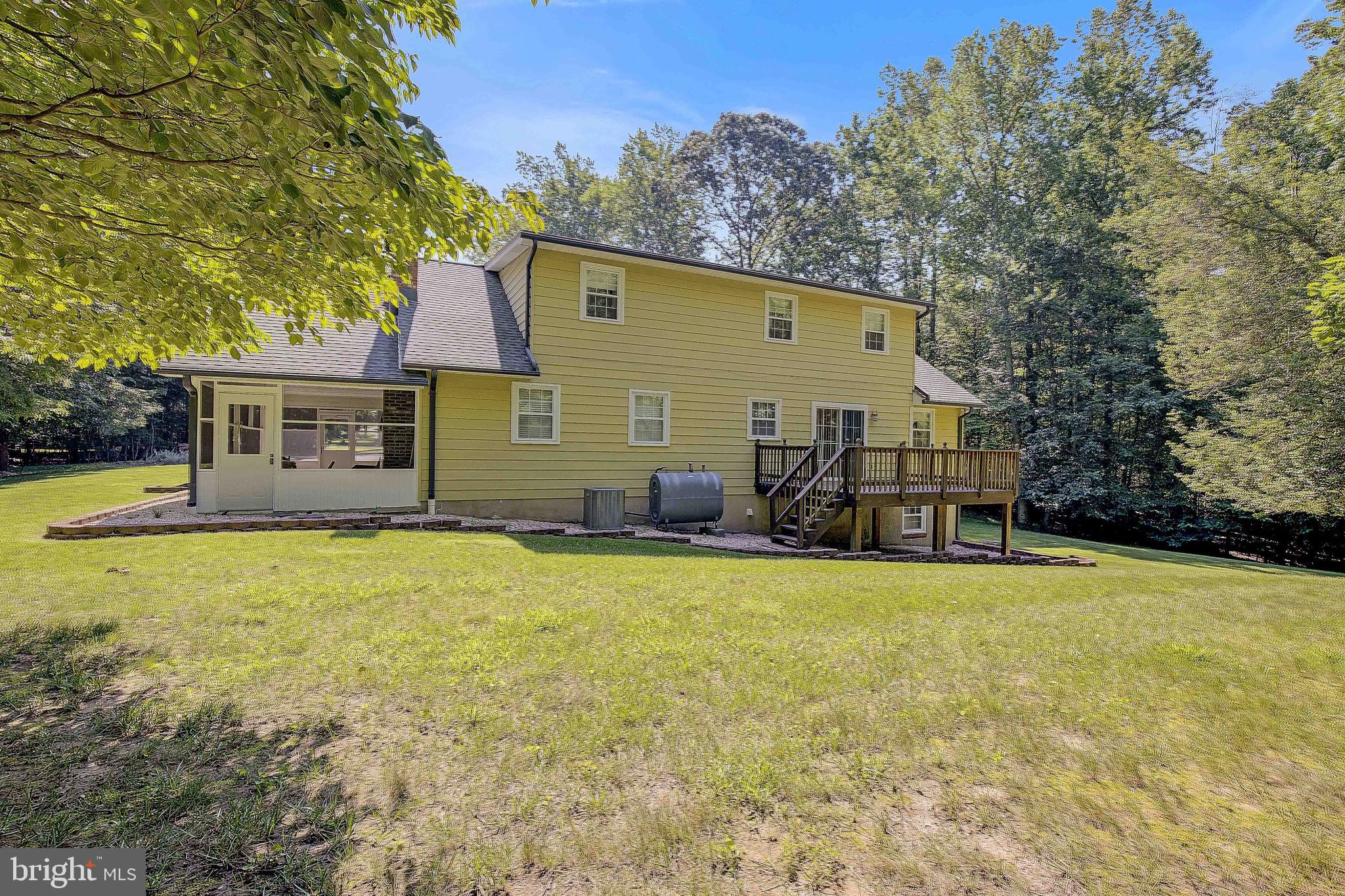 1750 Timber Court Huntingtown, MD 20639 - Photo 57 of 57 a view of a house with backyard and sitting area