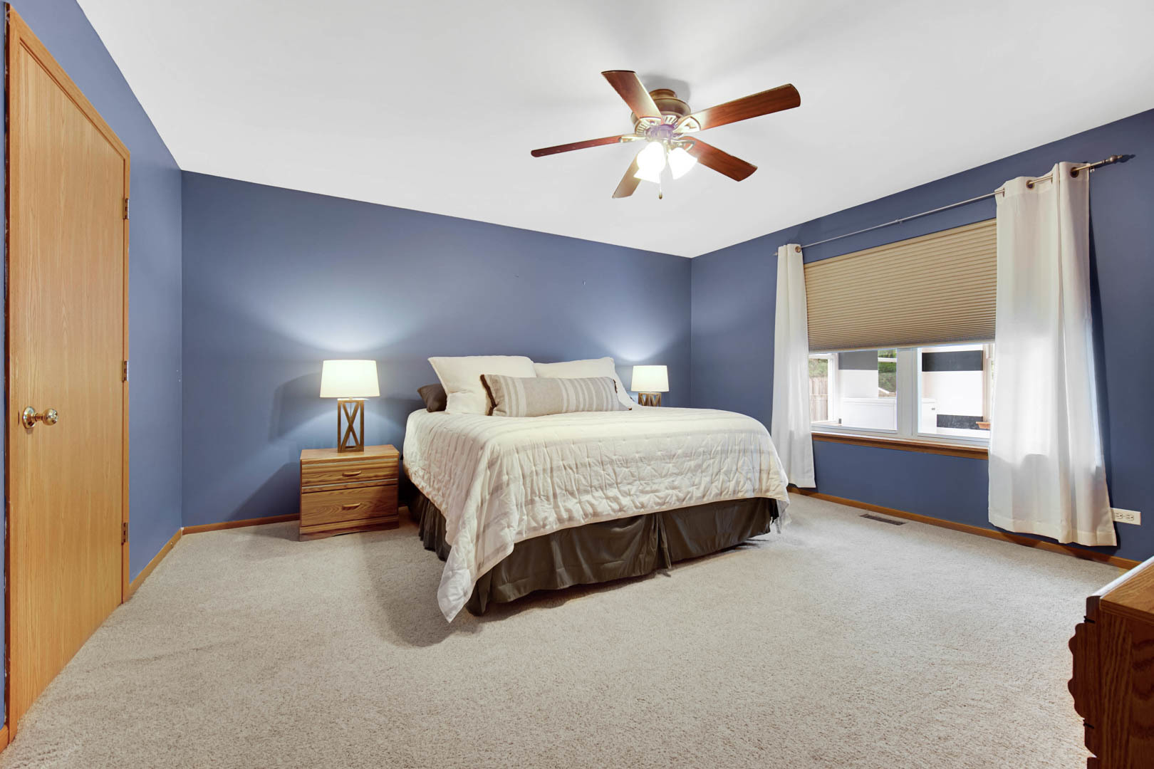 274 Spring Valley Way Round Lake, IL 60073 - Photo 16 of 28 a bedroom with a bed and window