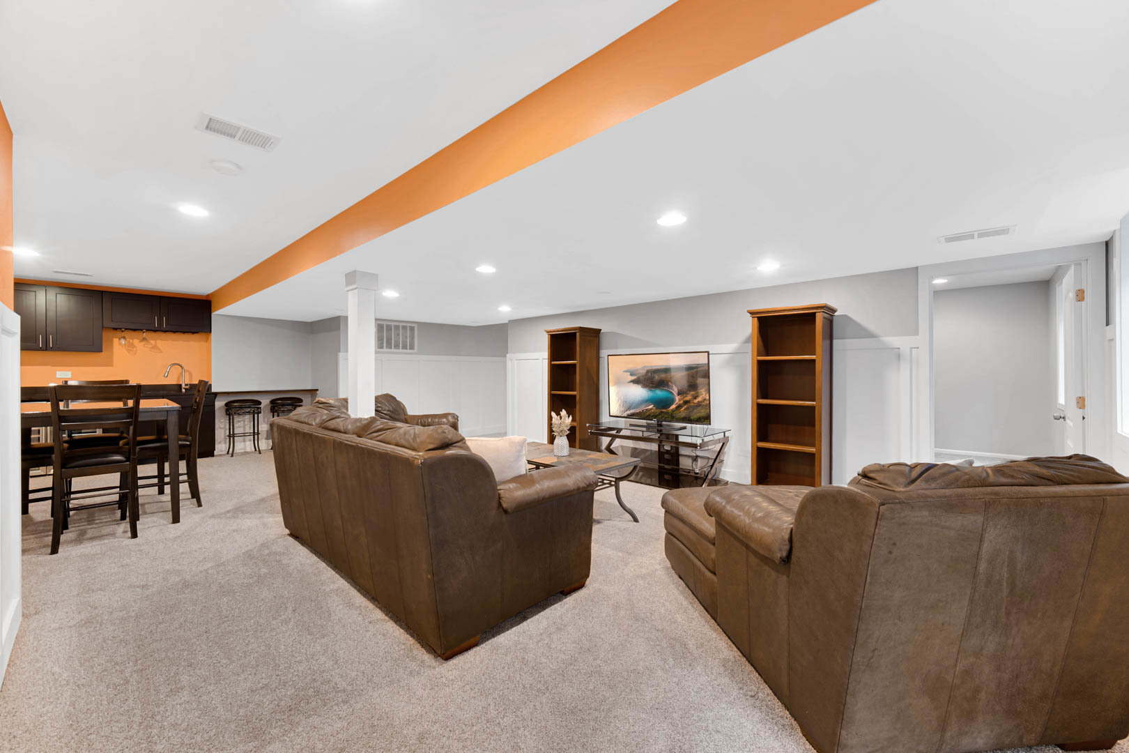 274 Spring Valley Way Round Lake, IL 60073 - Photo 19 of 28 a living room with furniture kitchen and a flat screen tv