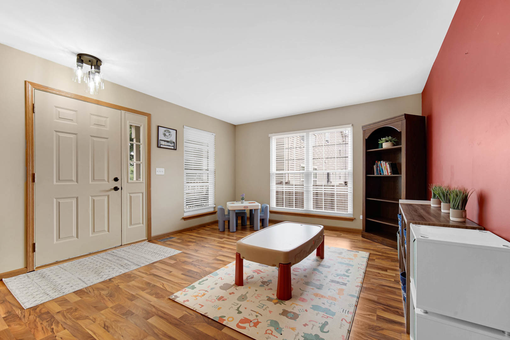 274 Spring Valley Way Round Lake, IL 60073 - Photo 2 of 28 a living room with furniture and wooden floor