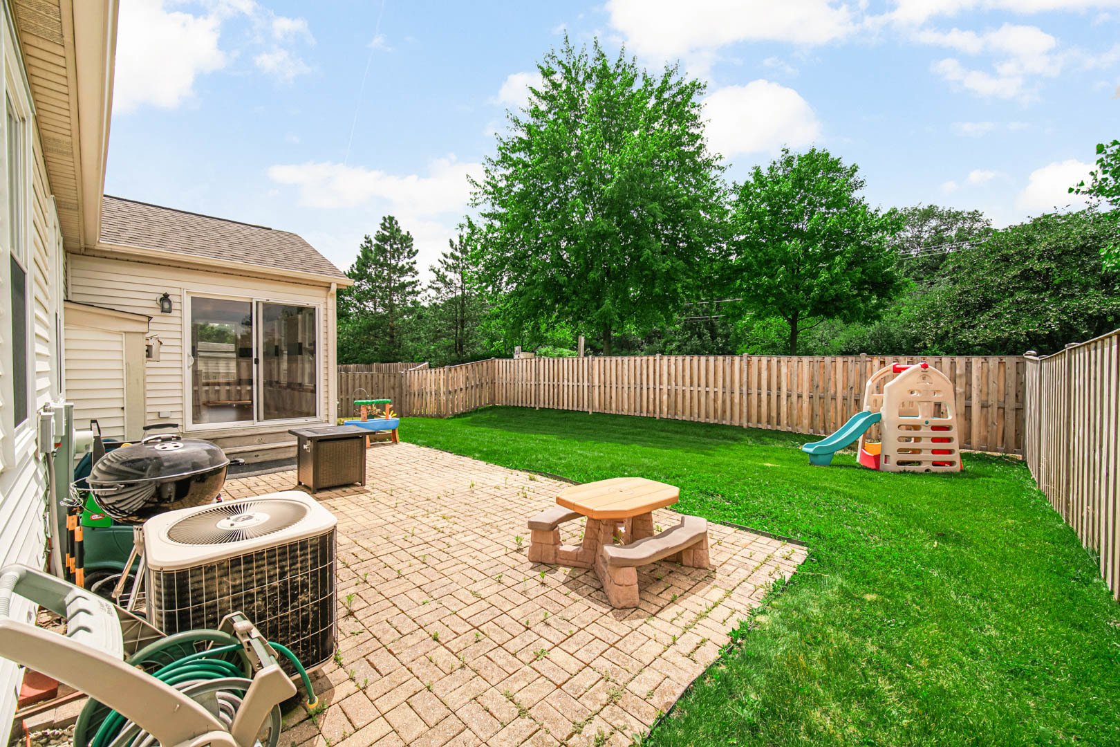 274 Spring Valley Way Round Lake, IL 60073 - Photo 25 of 28 a view of garden with patio