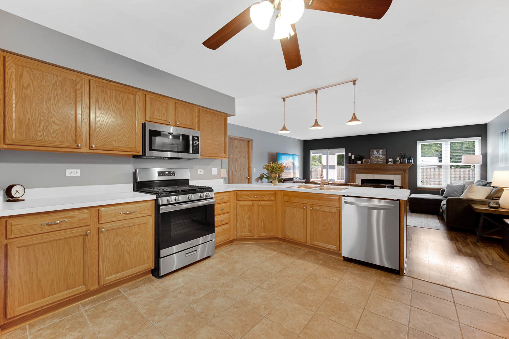 274 Spring Valley Way Round Lake, IL 60073 - Photo 10 of 28 a kitchen with a sink cabinets and window