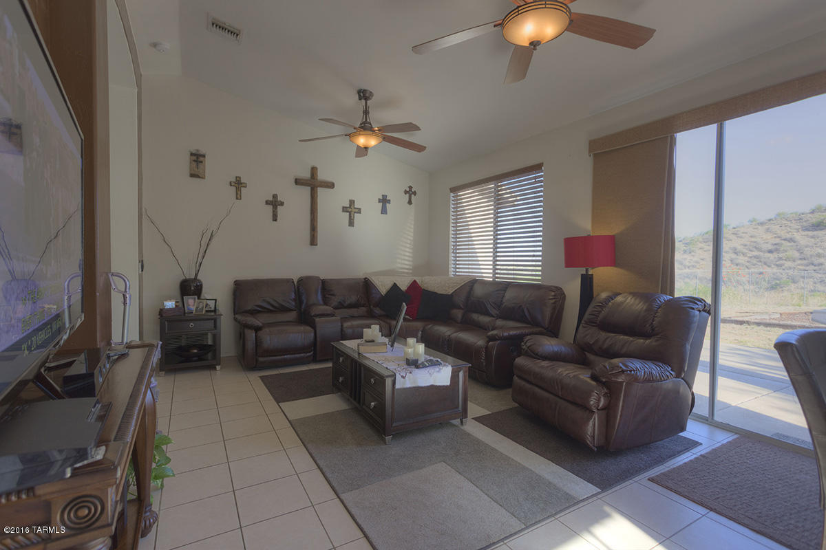 190 Camino Oceano Rio Rico, AZ 85648 - Photo 3 of 17 a living room with furniture and a chandelier