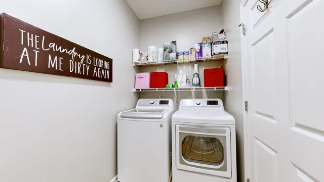 a utility room with dryer and washer