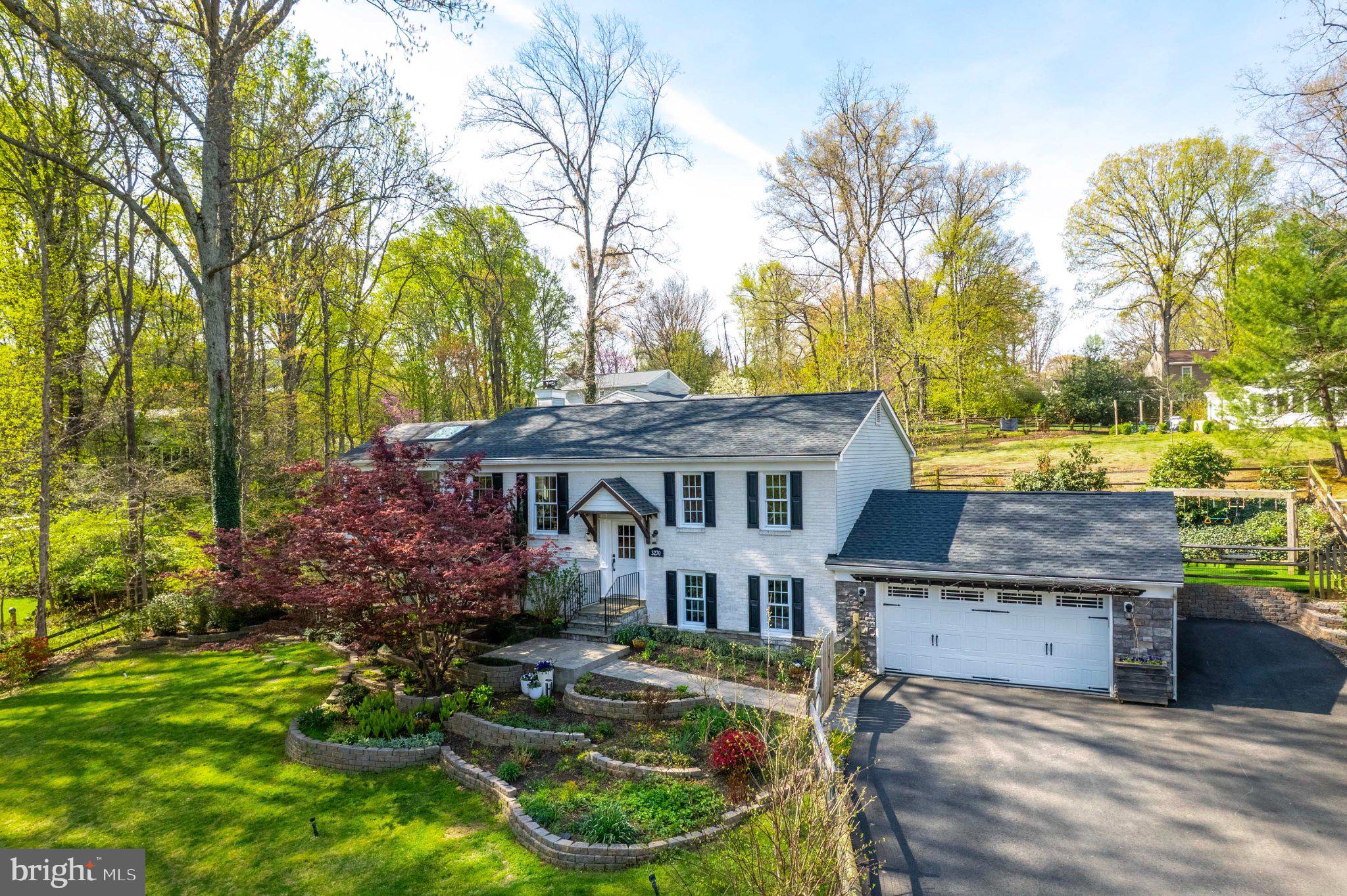3270 Fox Mill Road Oakton, VA 22124 - Photo 55 of 66 Charming home nestled in lush greenery.