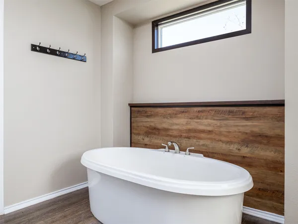 a bathroom with a white tub