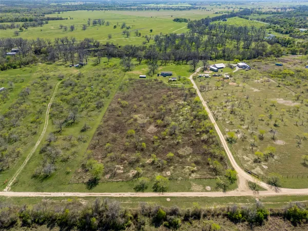 a view of a pool with a yard