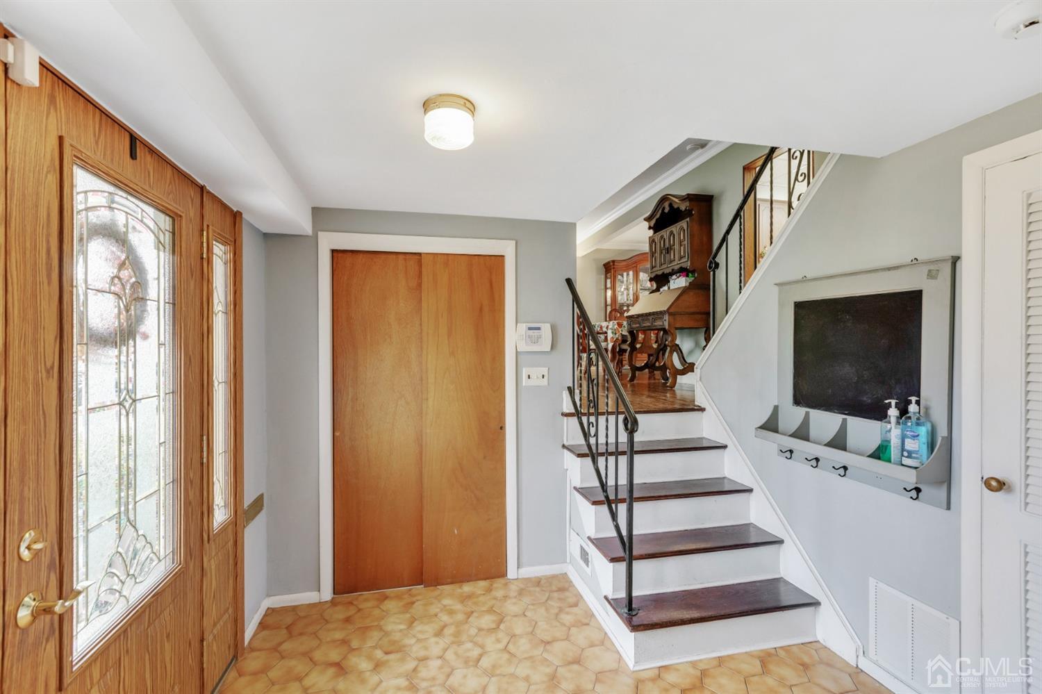 20 Hill Road Edison, NJ 08817 - Photo 2 of 15 a view of entryway and hall with wooden floor