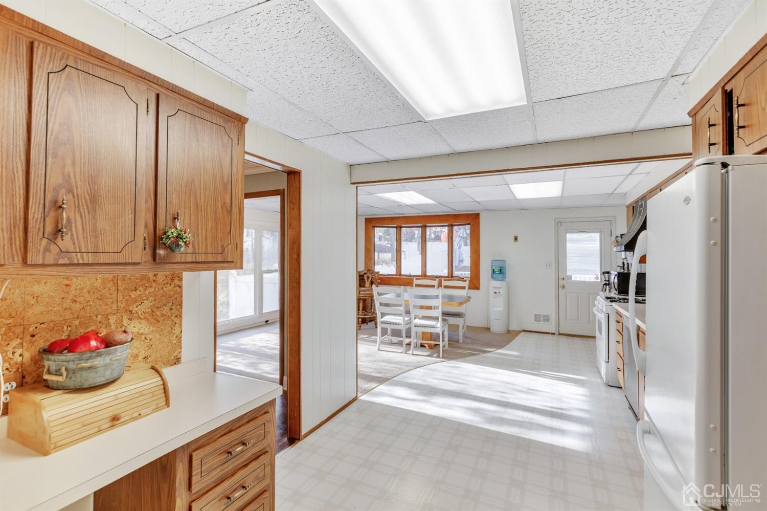 20 Hill Road Edison, NJ 08817 - Photo 4 of 15 a kitchen with granite countertop a refrigerator and a sink