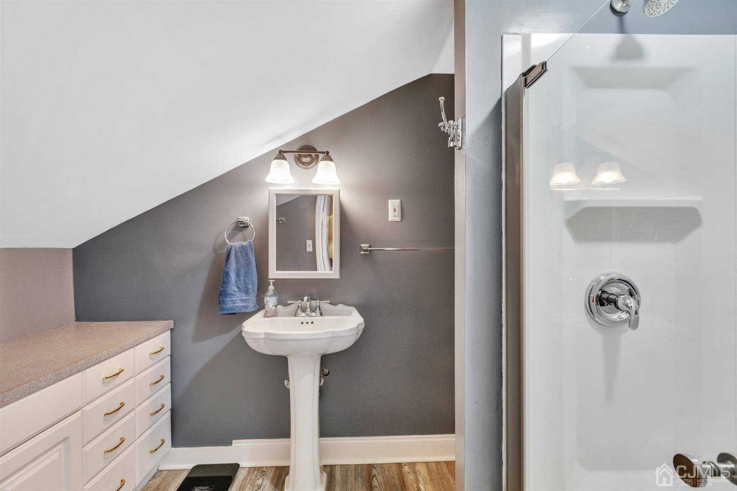 20 Hill Road Edison, NJ 08817 - Photo 10 of 15 a bathroom with a sink toilet and a mirror
