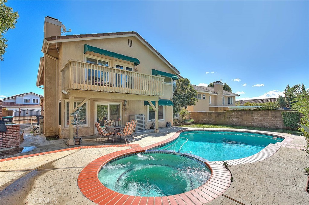 3417 Royal Ridge Road Chino Hills, CA 91709 - Photo 1 of 1 a view of a house with swimming pool and sitting area