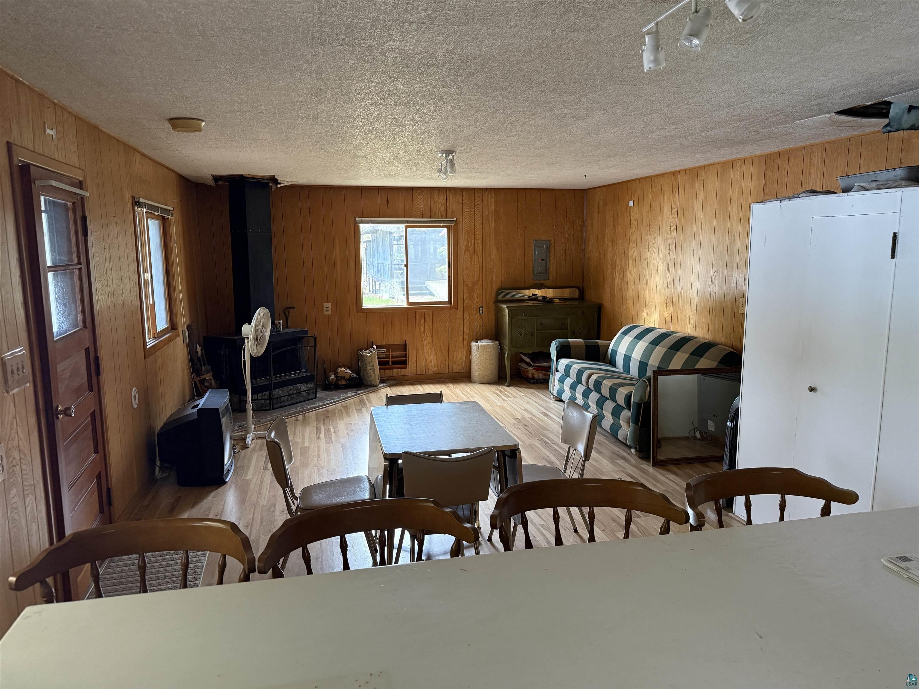 1342 Walsh Road Ely, MN 55731 - Photo 17 of 20 Multiple windows for natural light. 100 amp fuse panel in corner.
