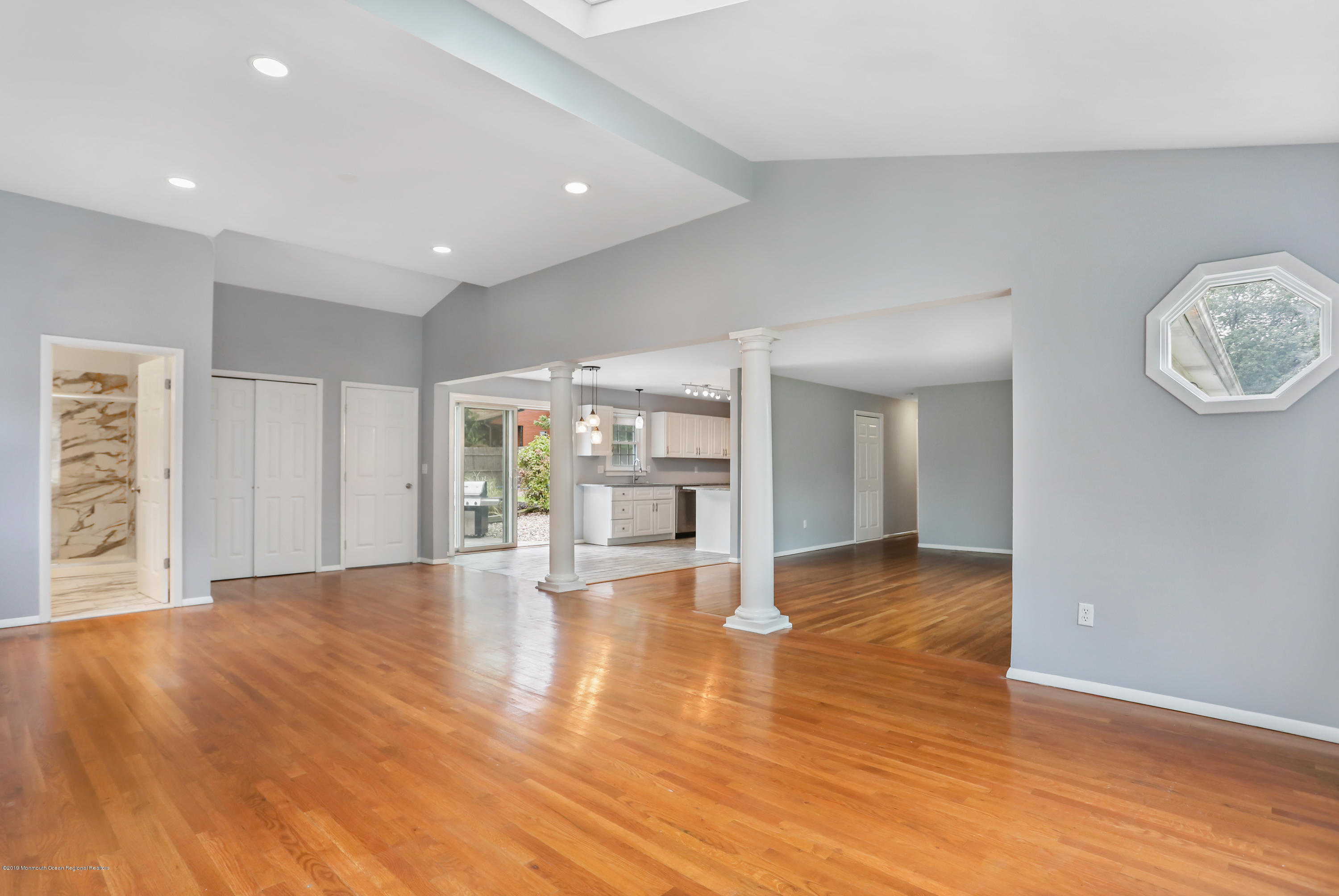 1822 Carmerville Road Wall, NJ 07719 - Photo 11 of 25 a view of an empty room with wooden floor and a window