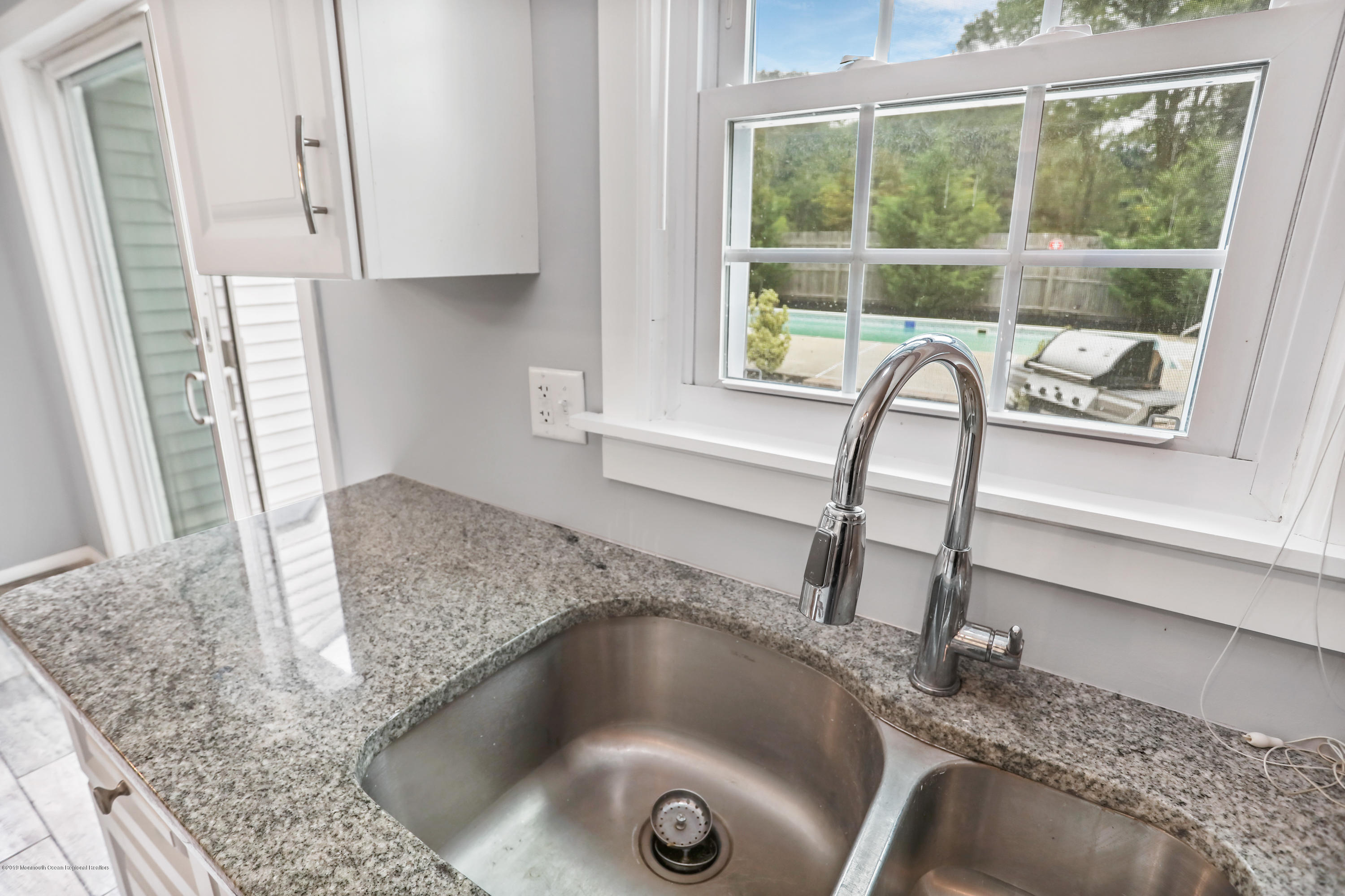 1822 Carmerville Road Wall, NJ 07719 - Photo 15 of 25 a kitchen with a sink and a window