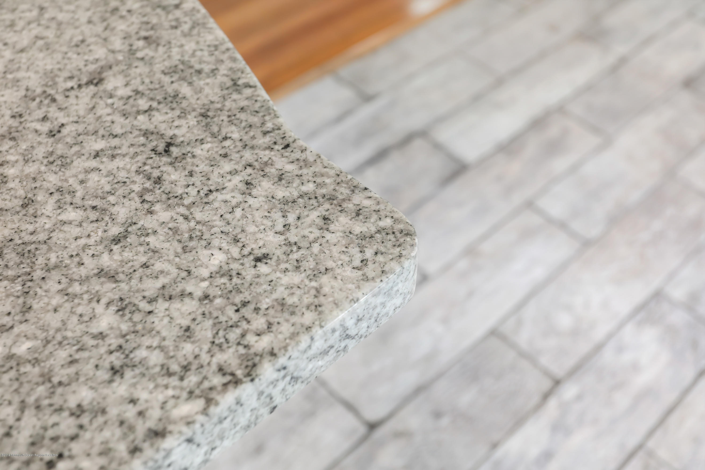 1822 Carmerville Road Wall, NJ 07719 - Photo 16 of 25 a close up of a white marble wall