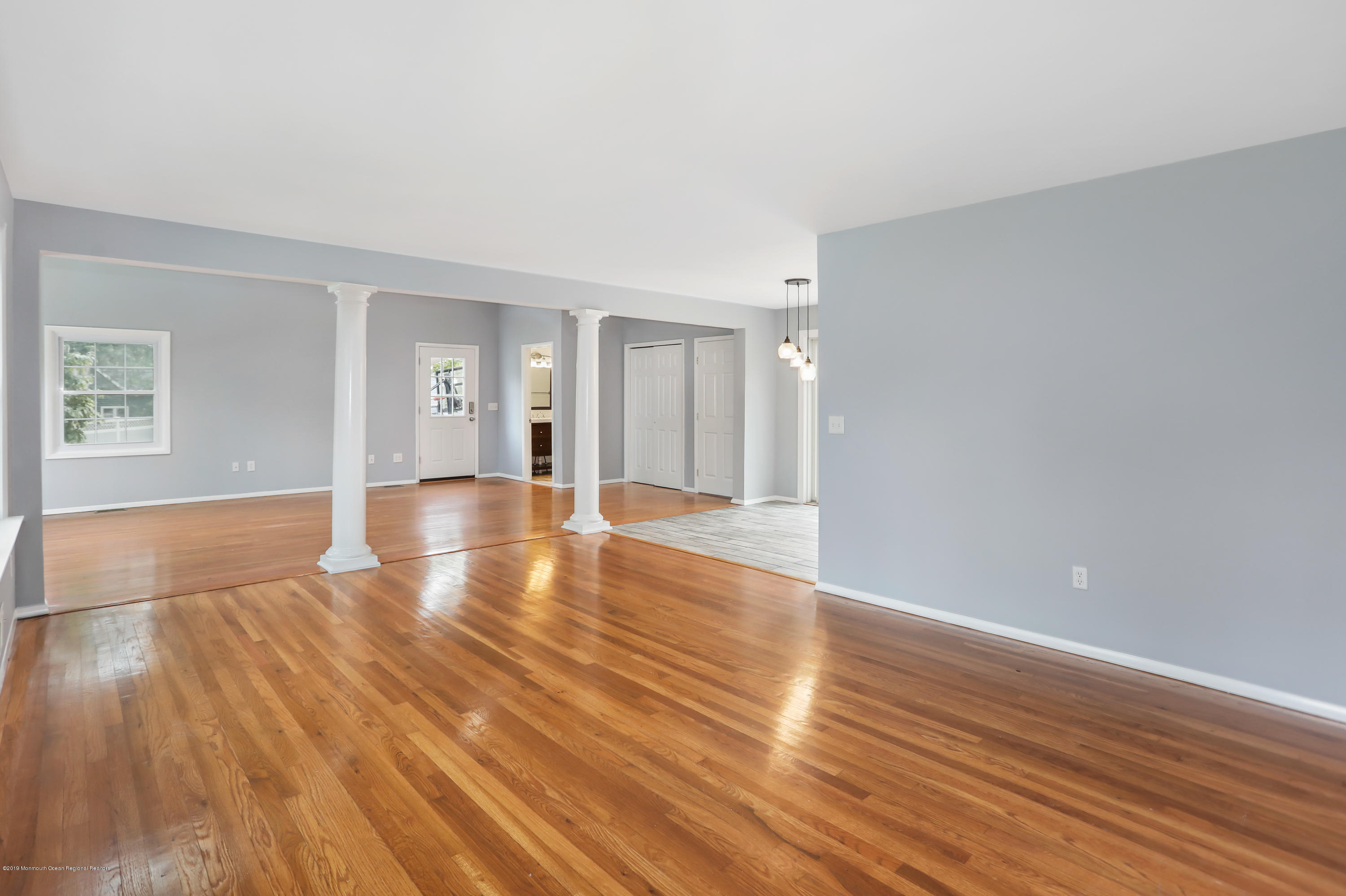 1822 Carmerville Road Wall, NJ 07719 - Photo 8 of 25 a view of an empty room with wooden floor